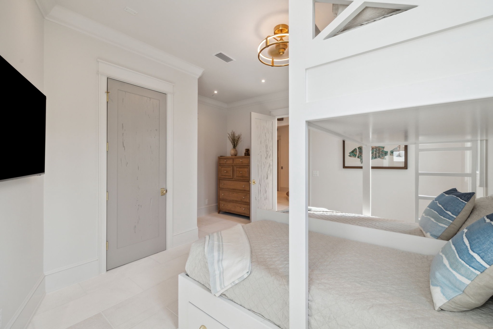 Relax in this bright, spacious bedroom designed for comfort. Soft carpeting and soothing coastal decor create a peaceful retreat where you can truly unwind.