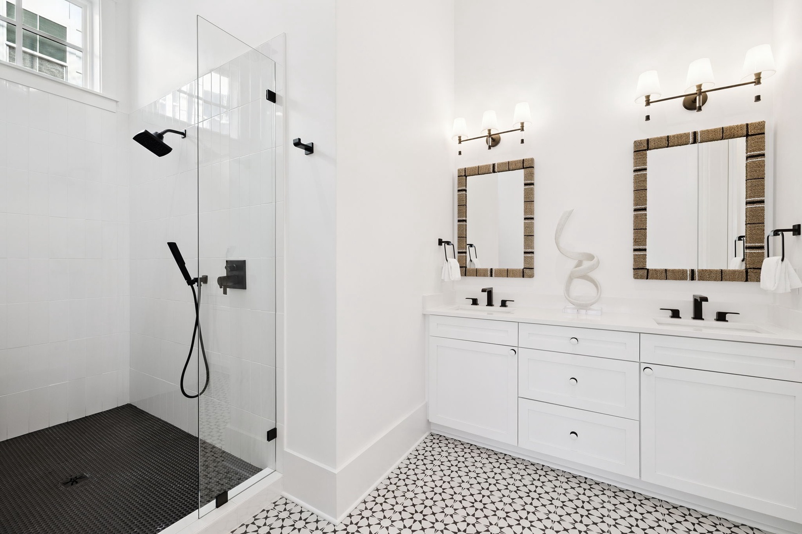 Step into your spa-like ensuite with rainfall shower, dual vanities, and stunning geometric floors that make mornings feel luxurious.