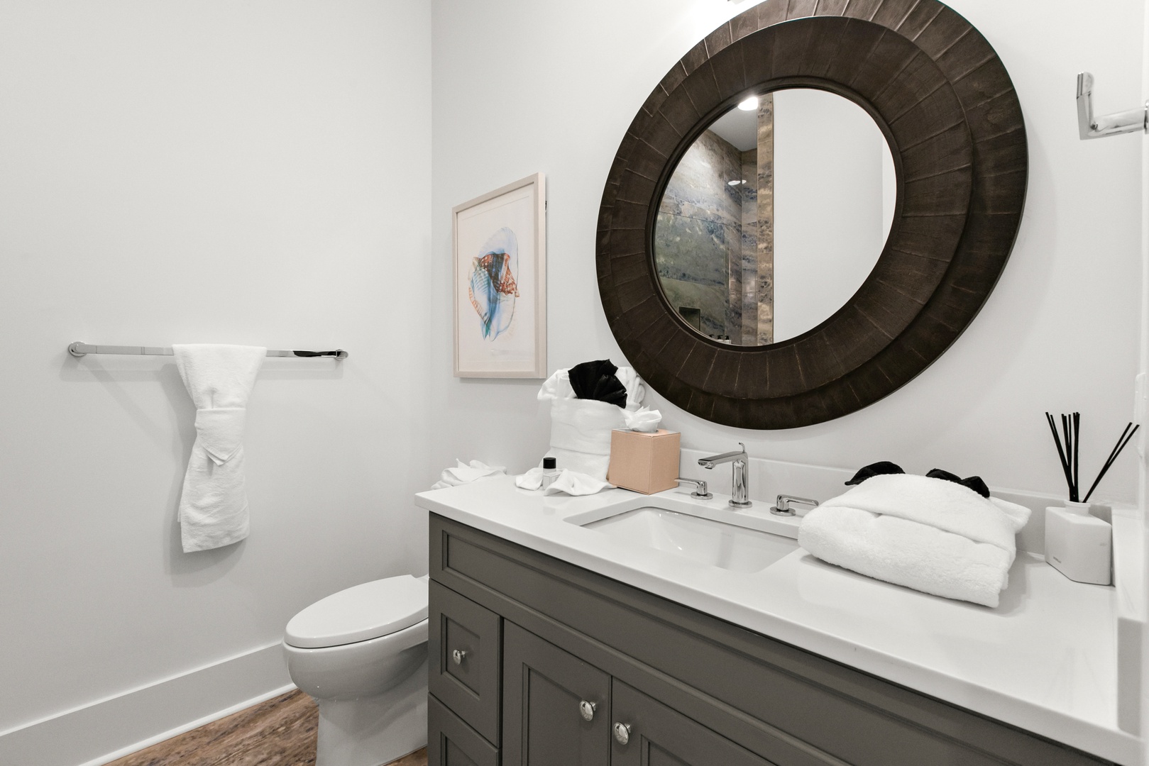 Step into your private, beautifully styled bathroom with fresh towels and thoughtful touches waiting to greet you after a long day.