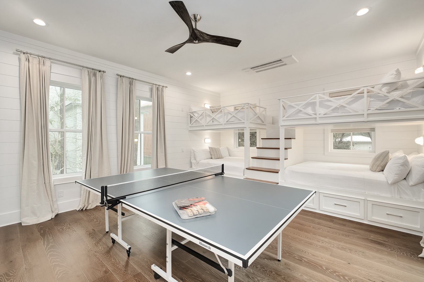 Your game room features built-in bunk beds and ping pong table - perfect for family fun and friendly competitions.