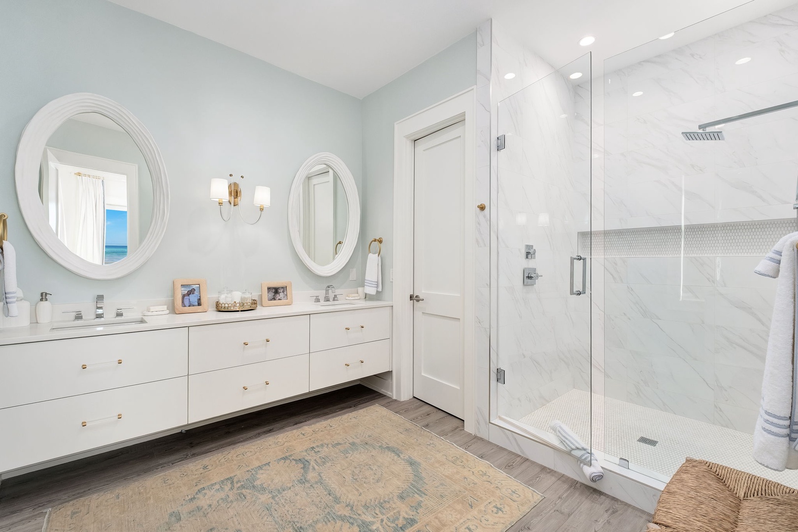 Slip into pure relaxation in your spa-inspired ensuite, where soft coastal hues, double vanities, and a luminous walk-in shower create your perfect morning and evening retreat.
