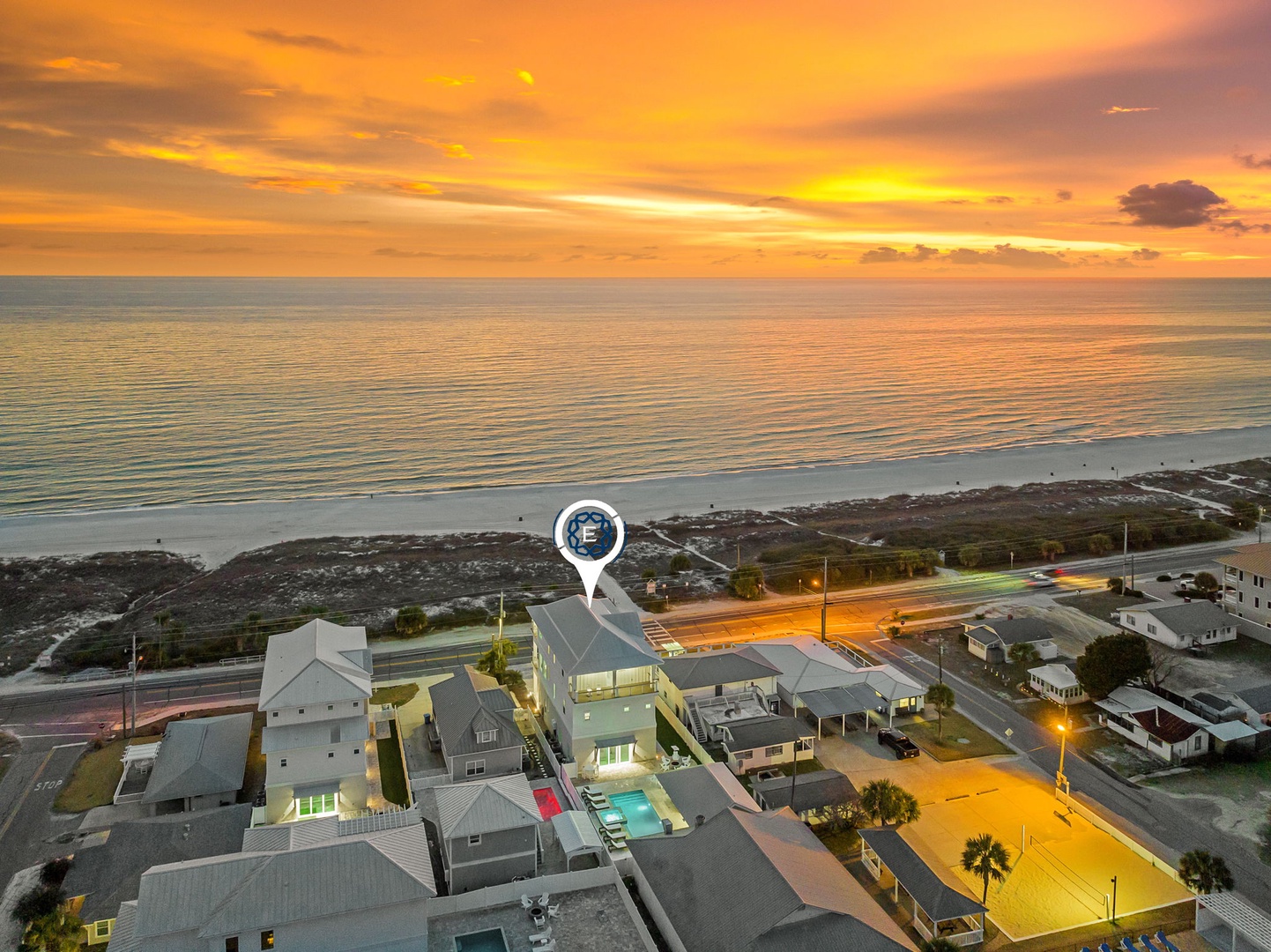 Spectacular beachfront location with stunning sunset views over the ocean, nestled in a peaceful coastal community just steps from pristine white sand.