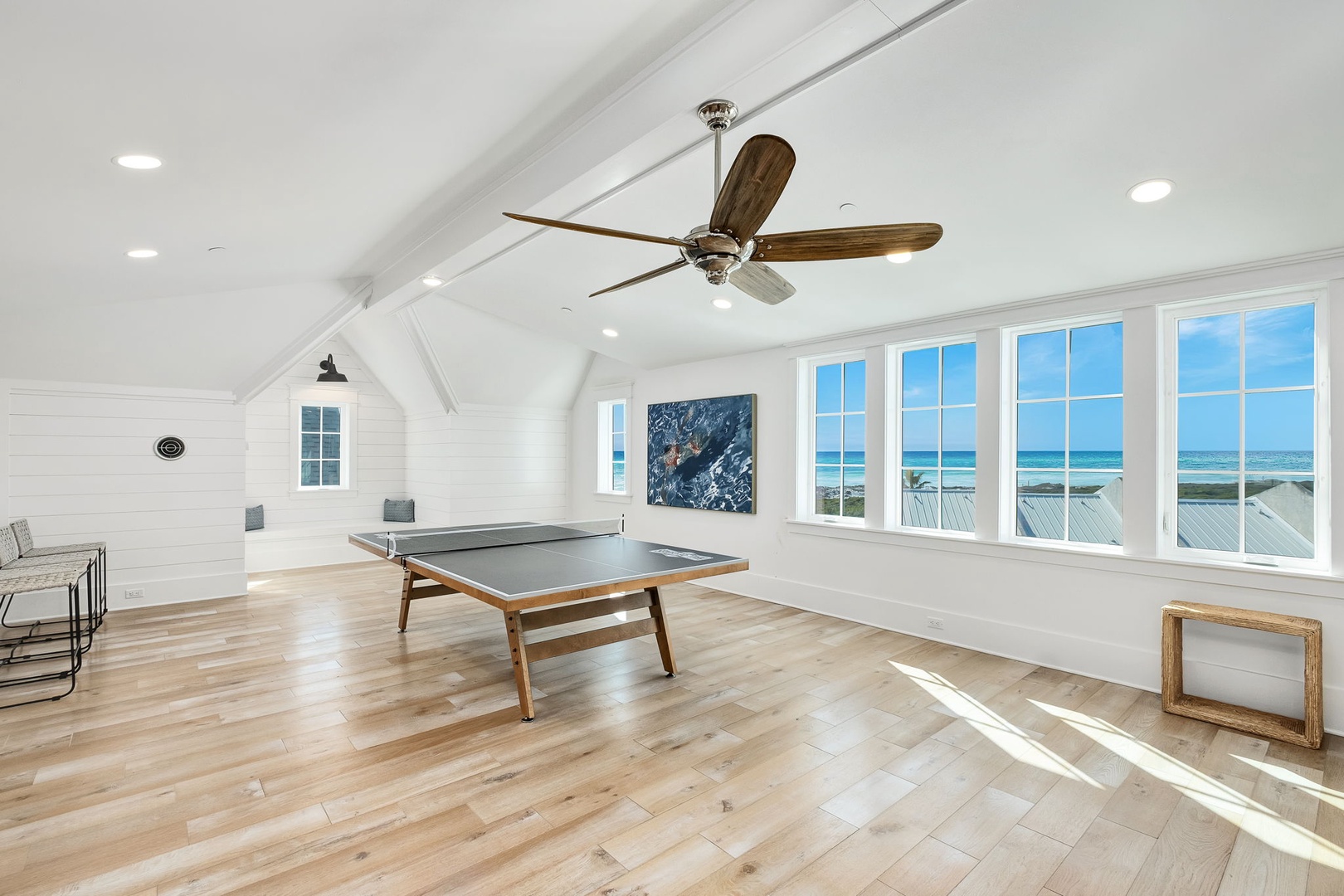 Challenge friends to ping pong while soaking in stunning ocean views from this bright, airy game room with vaulted ceilings.