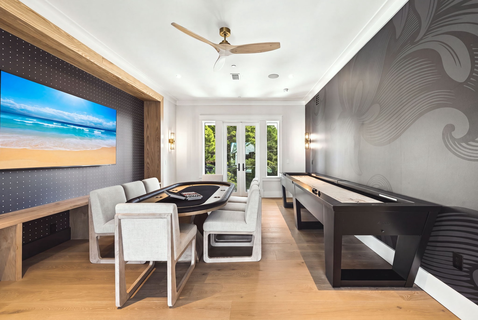 Your private game room awaits, complete with sleek tables for cards and billiards, stylish seating, and modern décor—perfect for friendly competition or unwinding after a day of adventure.