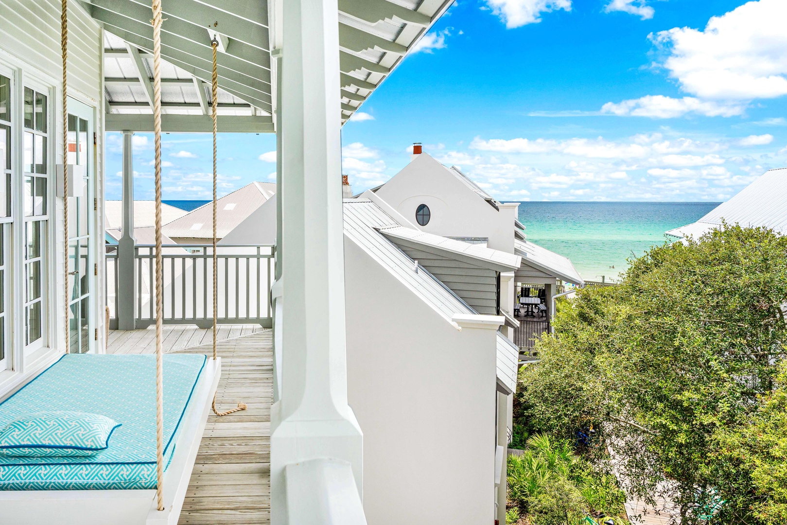 Swing gently on your private porch swing while taking in stunning ocean views and coastal breezes.