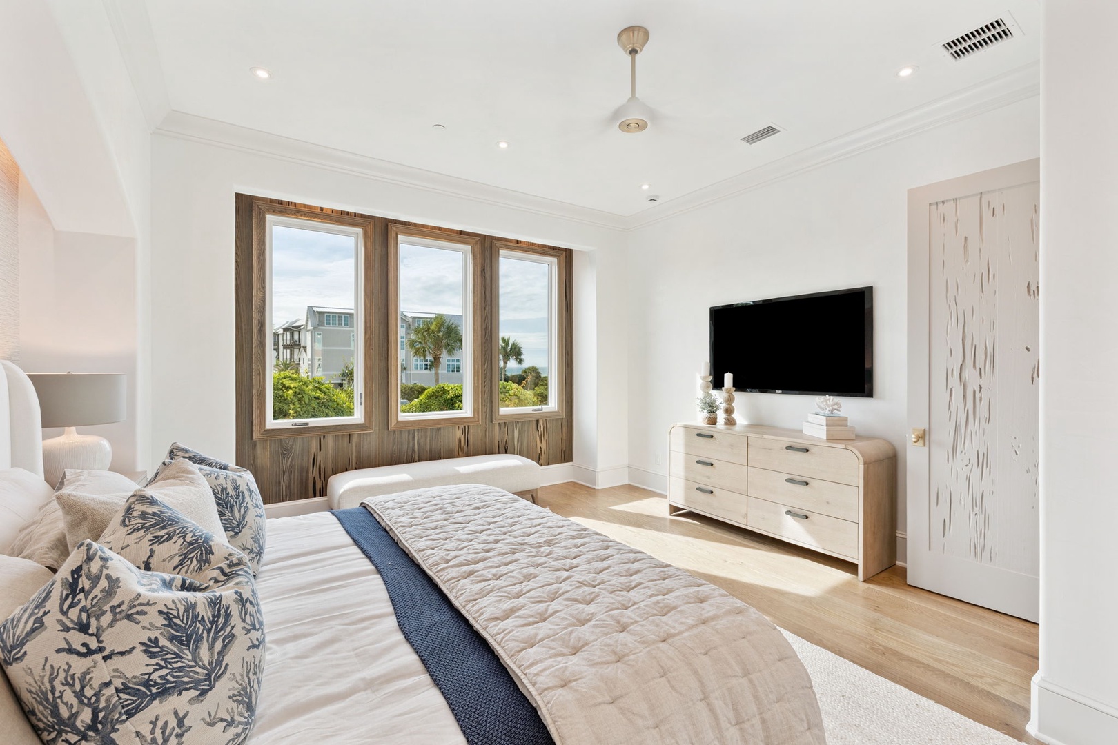 Drift off in this serene coastal retreat where natural light and refreshing sea breezes invite you to unwind. Your private sanctuary offers a perfect blend of modern comfort and seaside charm.