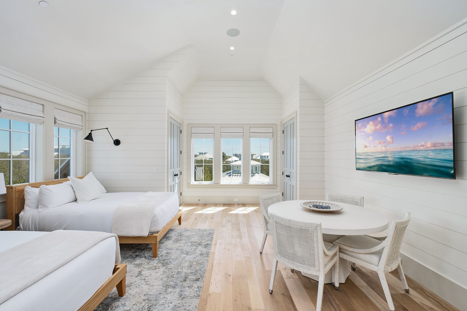 Relax in your bright coastal suite where twin beds and ocean views create the perfect retreat for restful nights.