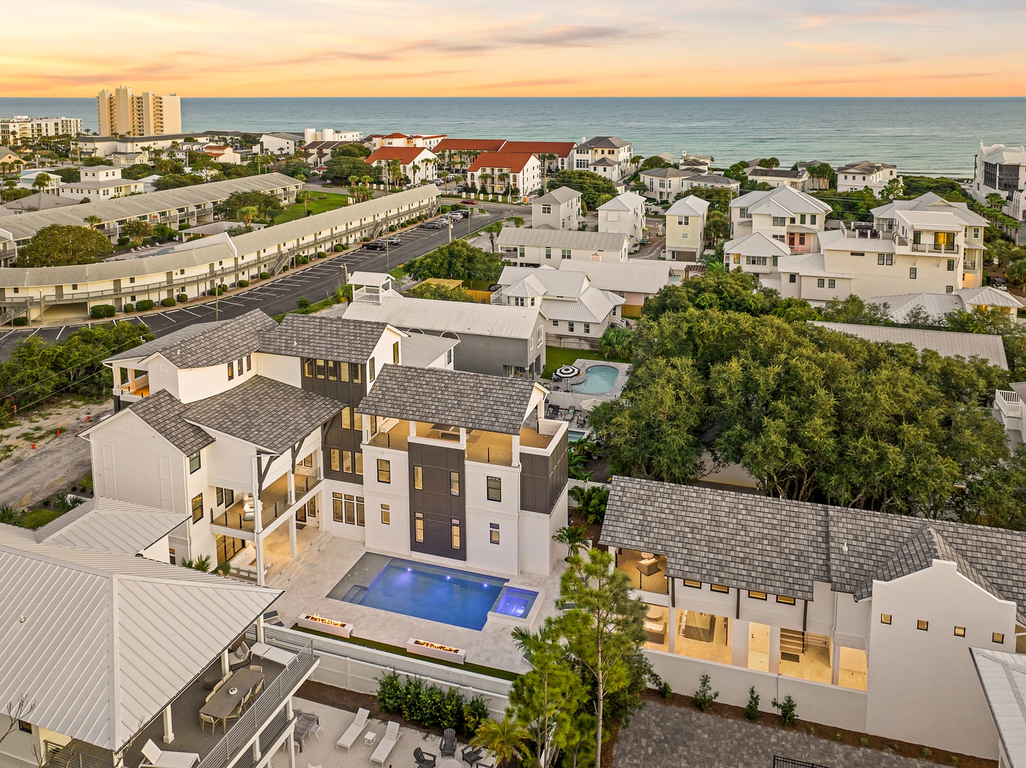 This stunning coastal retreat sits moments from the Gulf, surrounded by a vibrant beach neighborhood and offering easy access to local charm and seaside relaxation.