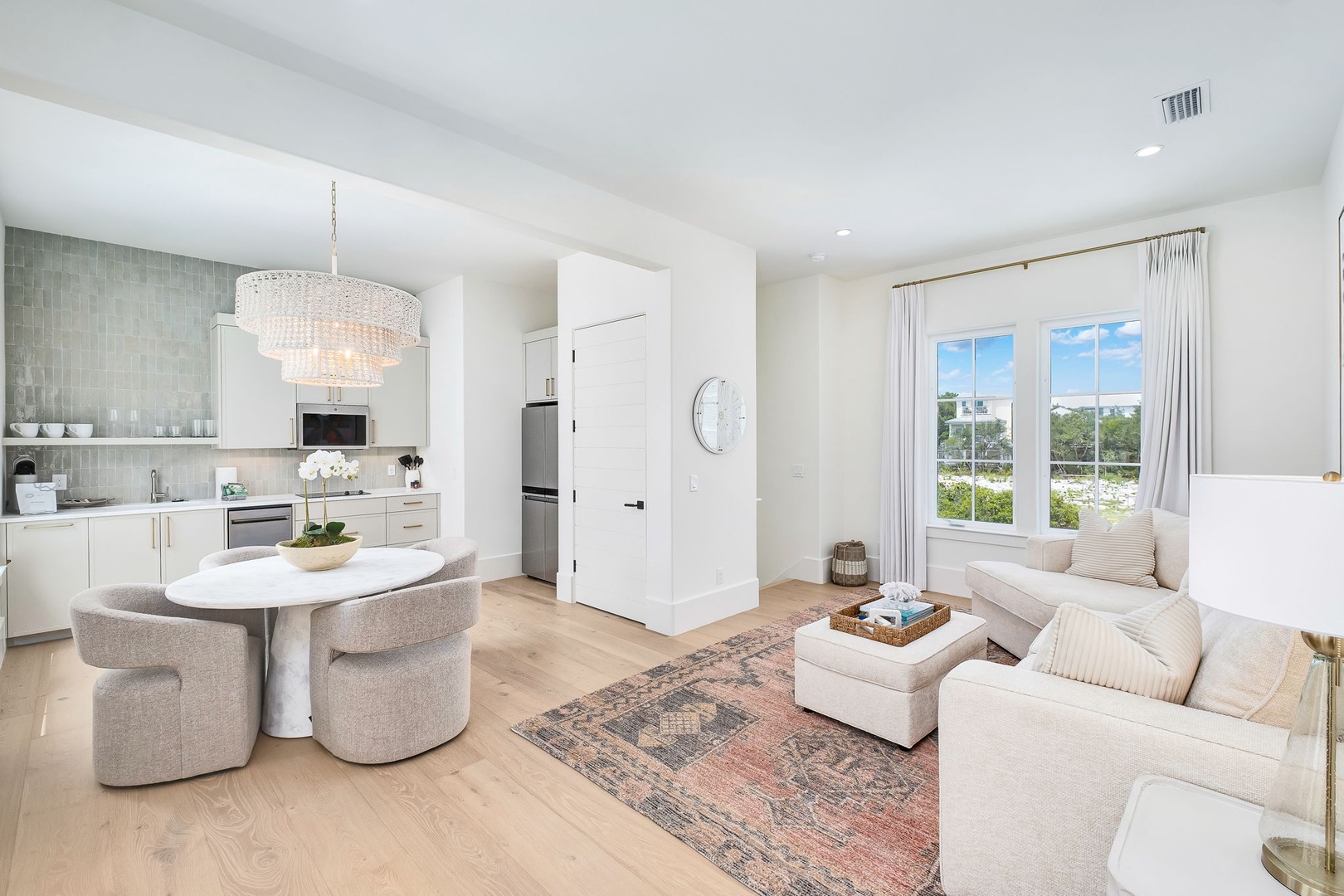 Unwind in your open-concept living space where soft seating and abundant natural light create the perfect retreat after a day of exploring.