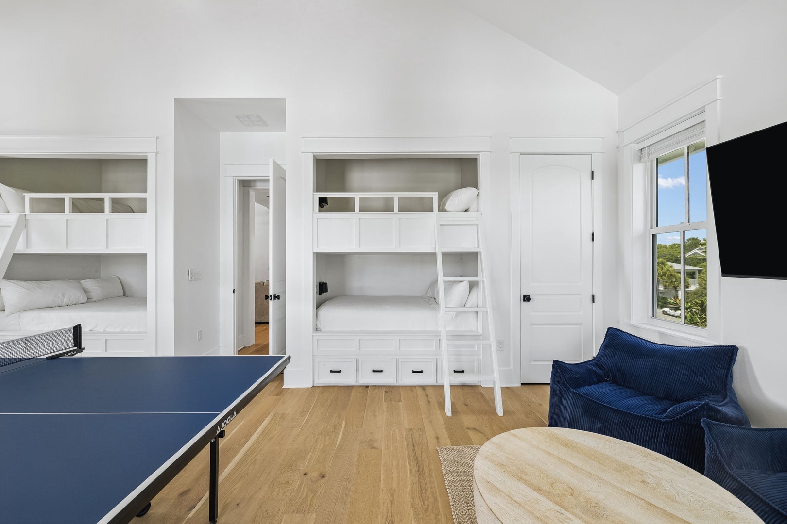 You'll love the bright, versatile space designed for fun and rest. Built-in bunks sleep your crew comfortably, while the table tennis table and cozy sofa create room for play and downtime together.