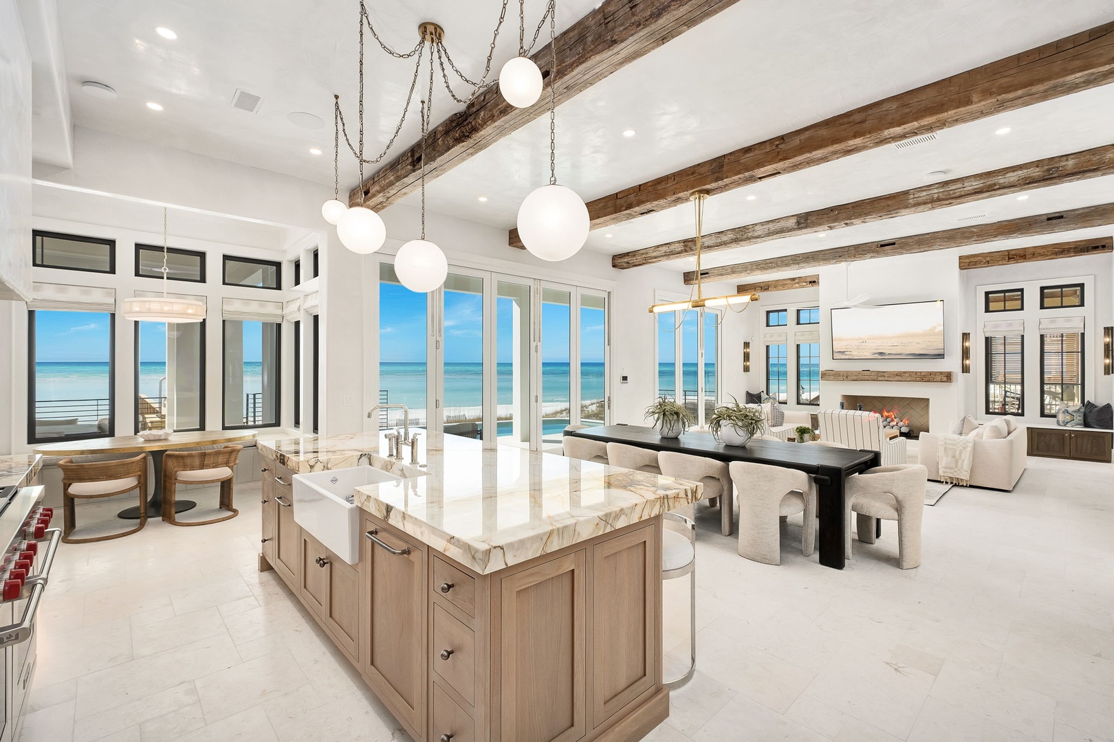 Step into your stunning oceanfront haven where exposed beams meet modern luxury, and floor-to-ceiling windows frame endless sea views.