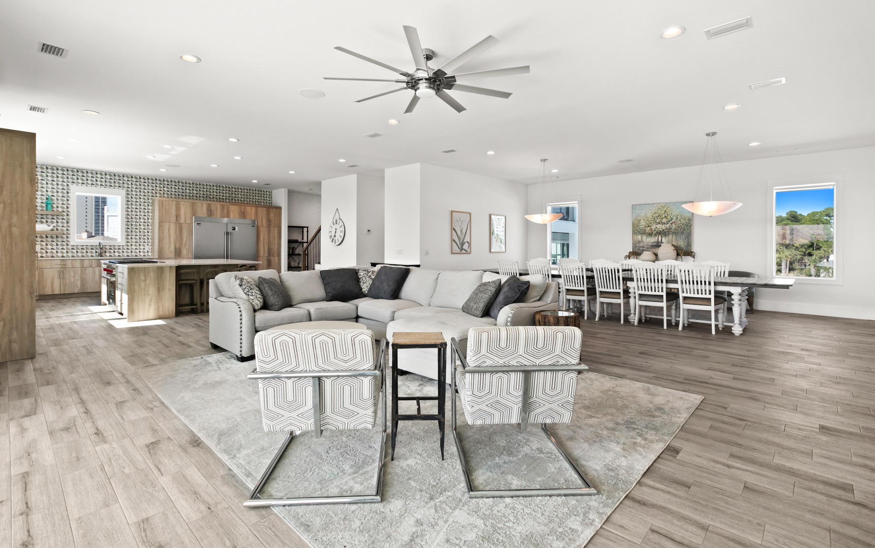 Bright and spacious open-concept living area with modern comfort and plenty of room to gather, relax, and make yourselves at home.