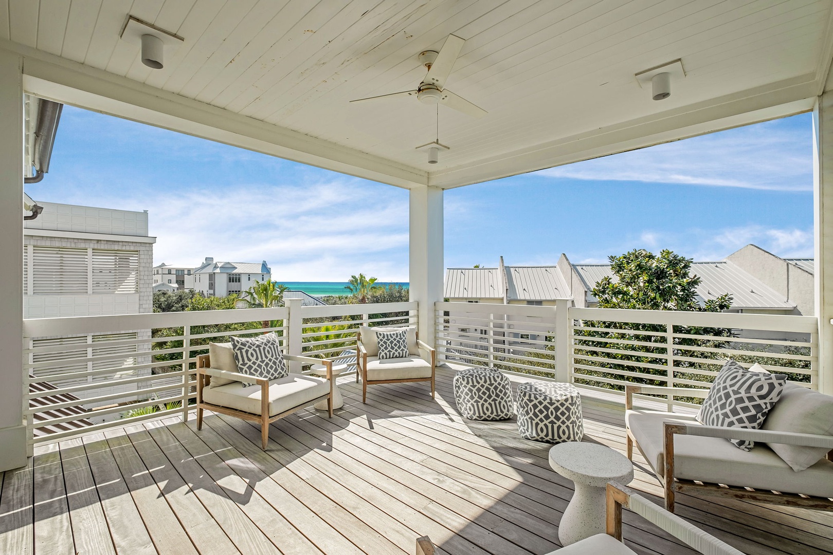 Relax on your private covered terrace with stunning sea views, where coastal breezes and comfortable seating create the perfect spot for morning coffee.