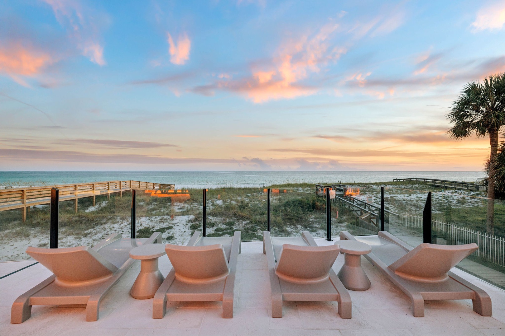 Stunning beachfront terrace with direct beach access and breathtaking sunset views over the Gulf. Lounge under palm trees as soft ocean breezes wash over you—your perfect coastal escape awaits.