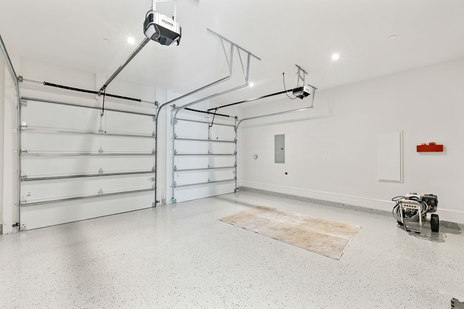 Spacious, climate-controlled garage with automatic opener and epoxy flooring provides secure parking and extra storage space for all your travel gear and equipment.
