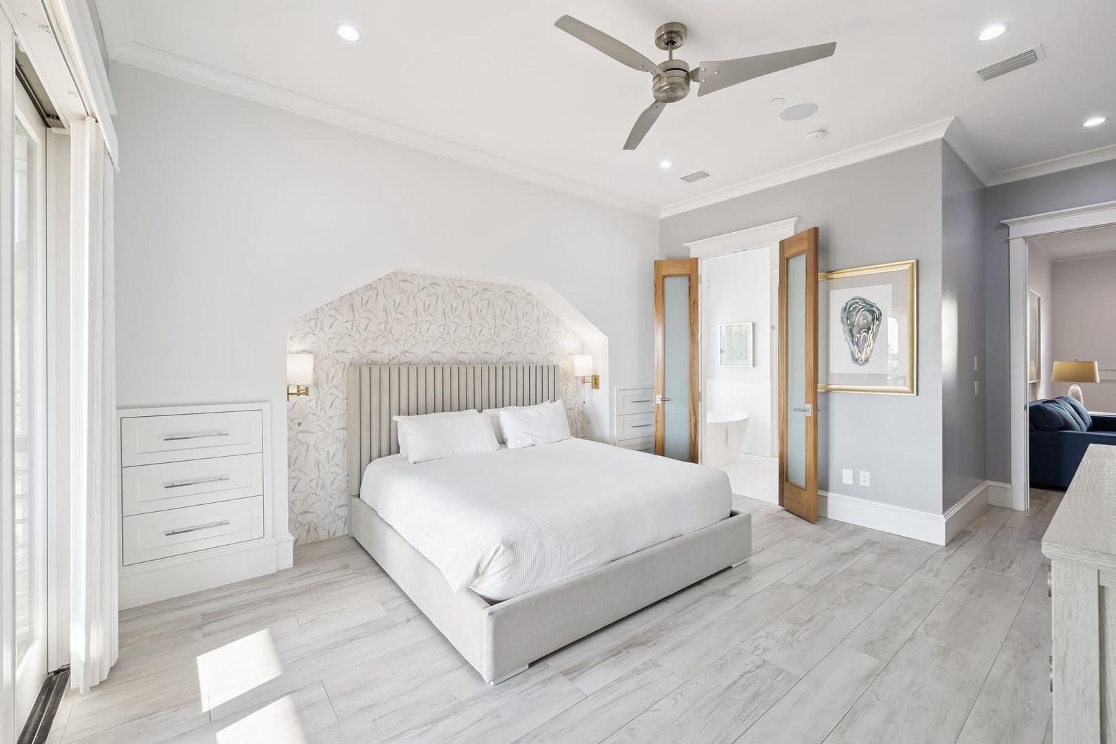 Sink into your private sanctuary with luxurious linens and elegant details that welcome you to unwind in sophisticated comfort.