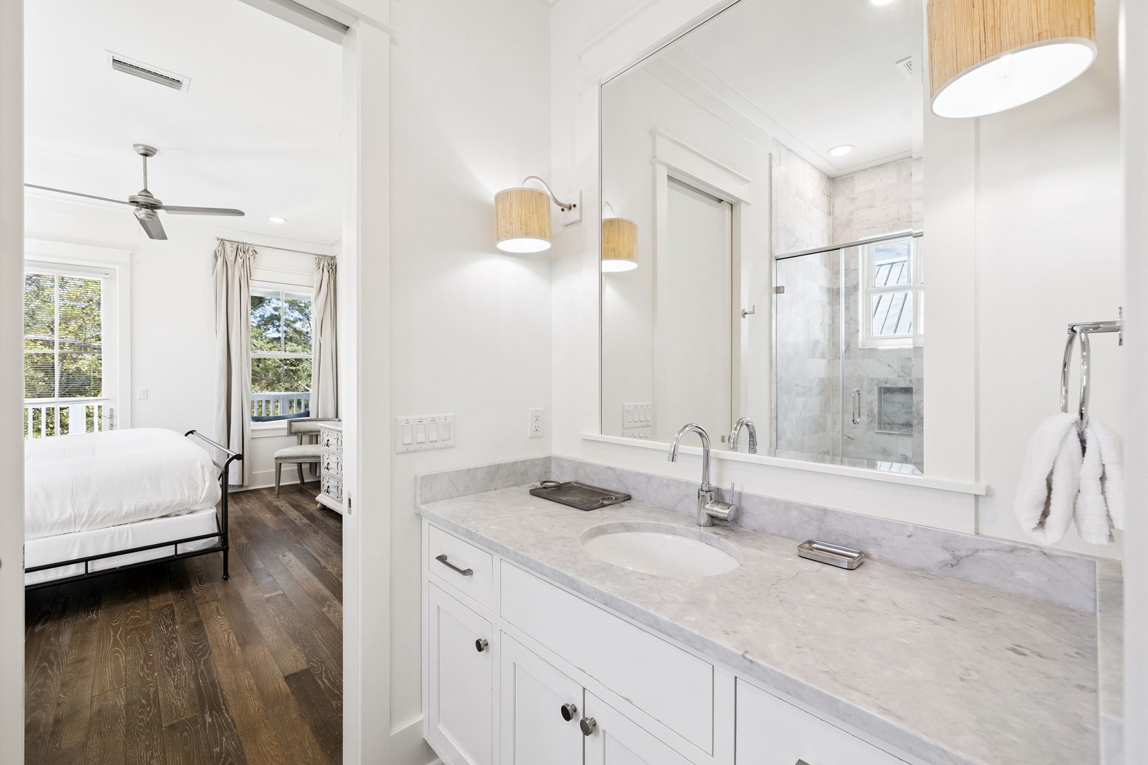 Refresh in your bright ensuite with marble counters and modern fixtures, just steps from your peaceful bedroom retreat.