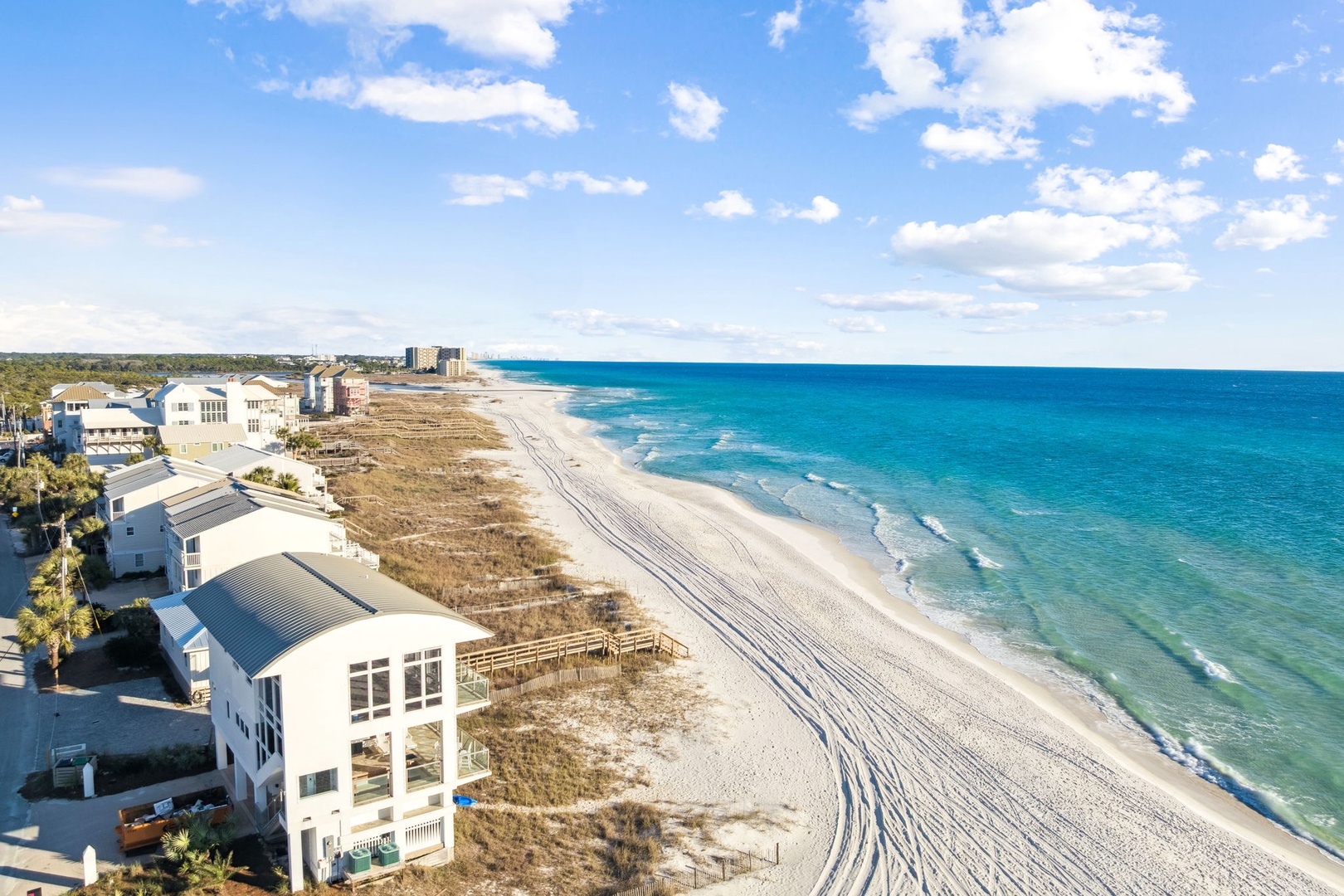 Pristine beach within walking distance, enjoy crystal-clear turquoise waters and expansive sandy shores stretching along the coastline.