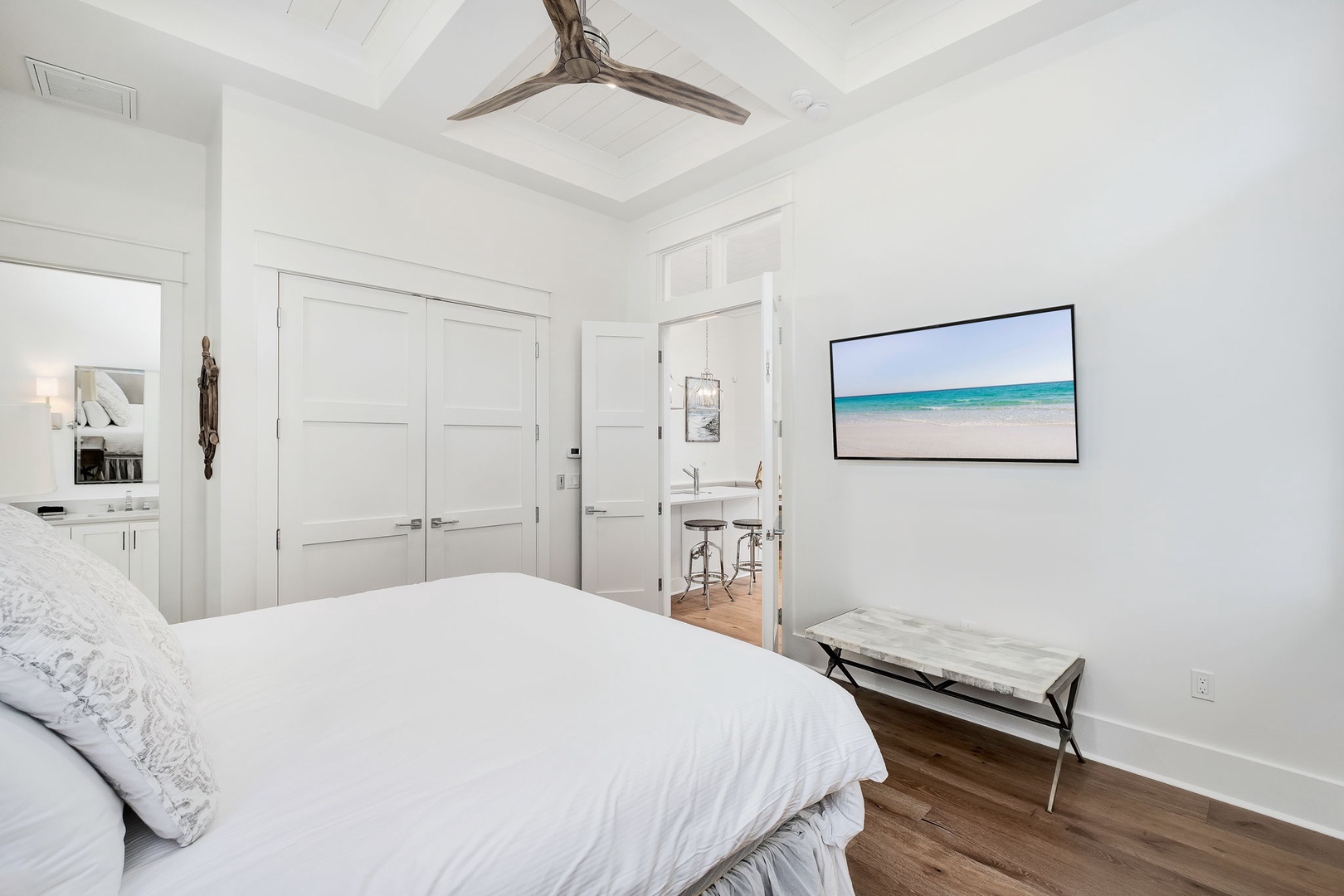 Sink into soft, luxurious bedding and unwind in your bright, peaceful retreat. High ceilings and airy design create a calm, inviting sanctuary just for you.