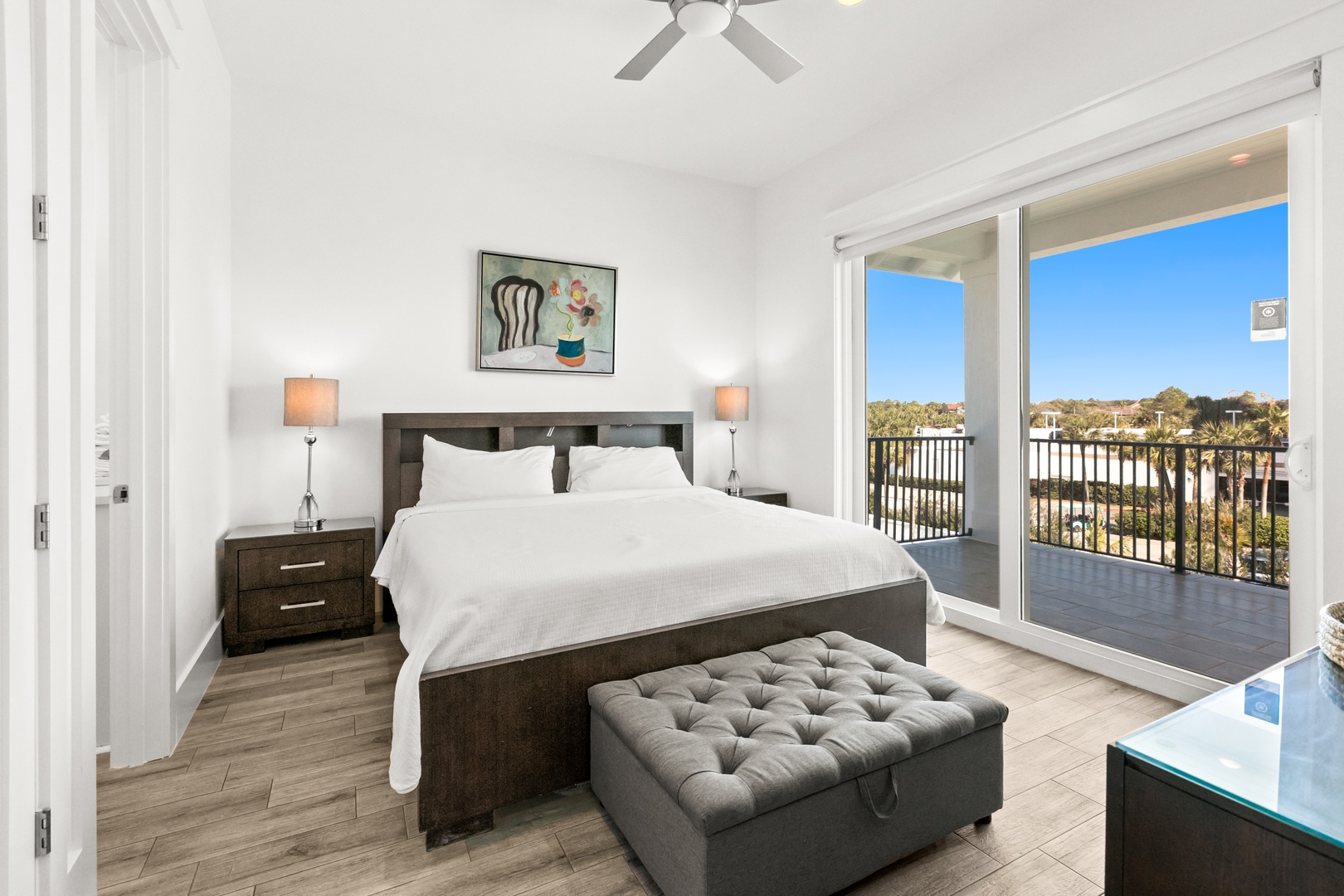 Wake up to views of lush treetops and open skies from your tranquil bedroom retreat. Step onto your private balcony and breathe in the fresh air.