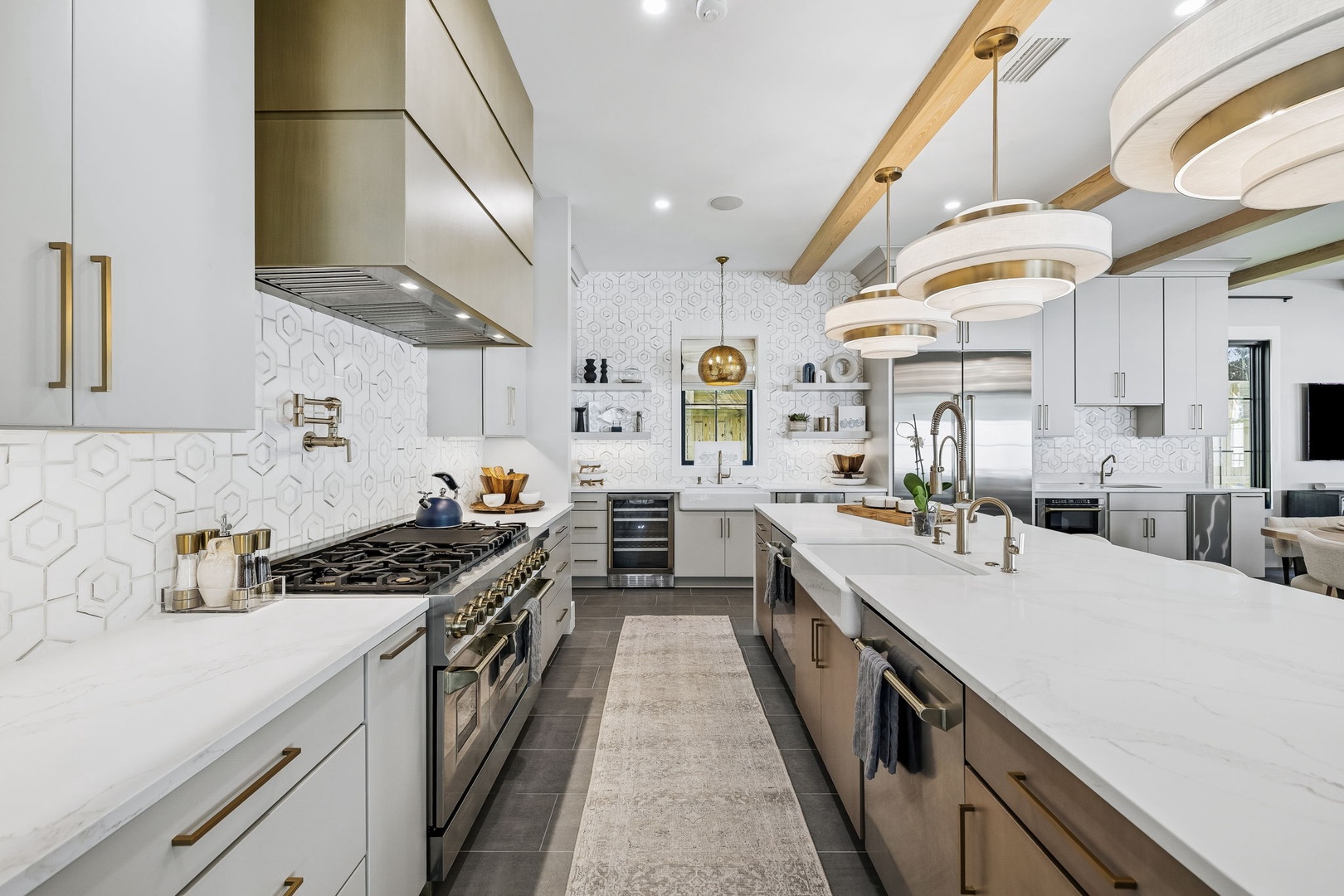 Picture yourself preparing gourmet meals in this designer kitchen, complete with gleaming marble counters, top-of-the-line appliances, and all the space you need to cook and entertain effortlessly.