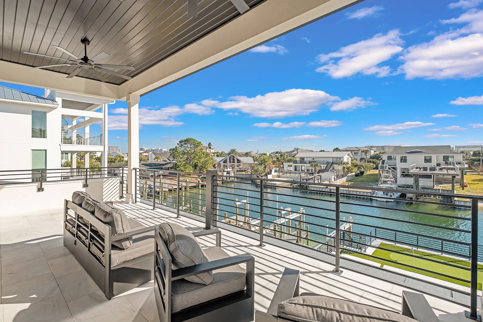 Soak up the sunshine on your private waterfront balcony, where modern comfort meets stunning canal views.