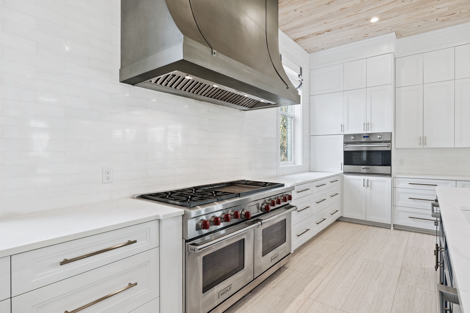Your spacious gourmet kitchen features professional-grade appliances, gleaming countertops, and ample storage for all your culinary adventures.