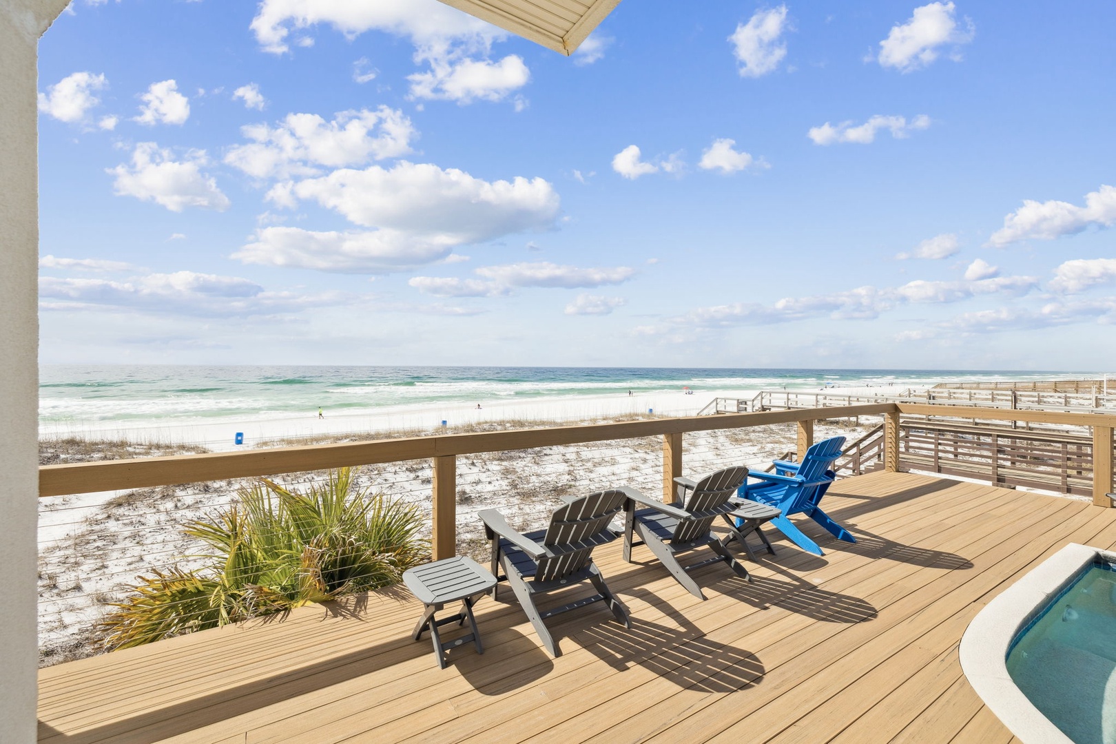 Relax in your beachfront Adirondack chairs while waves roll onto pristine white sand just steps away.