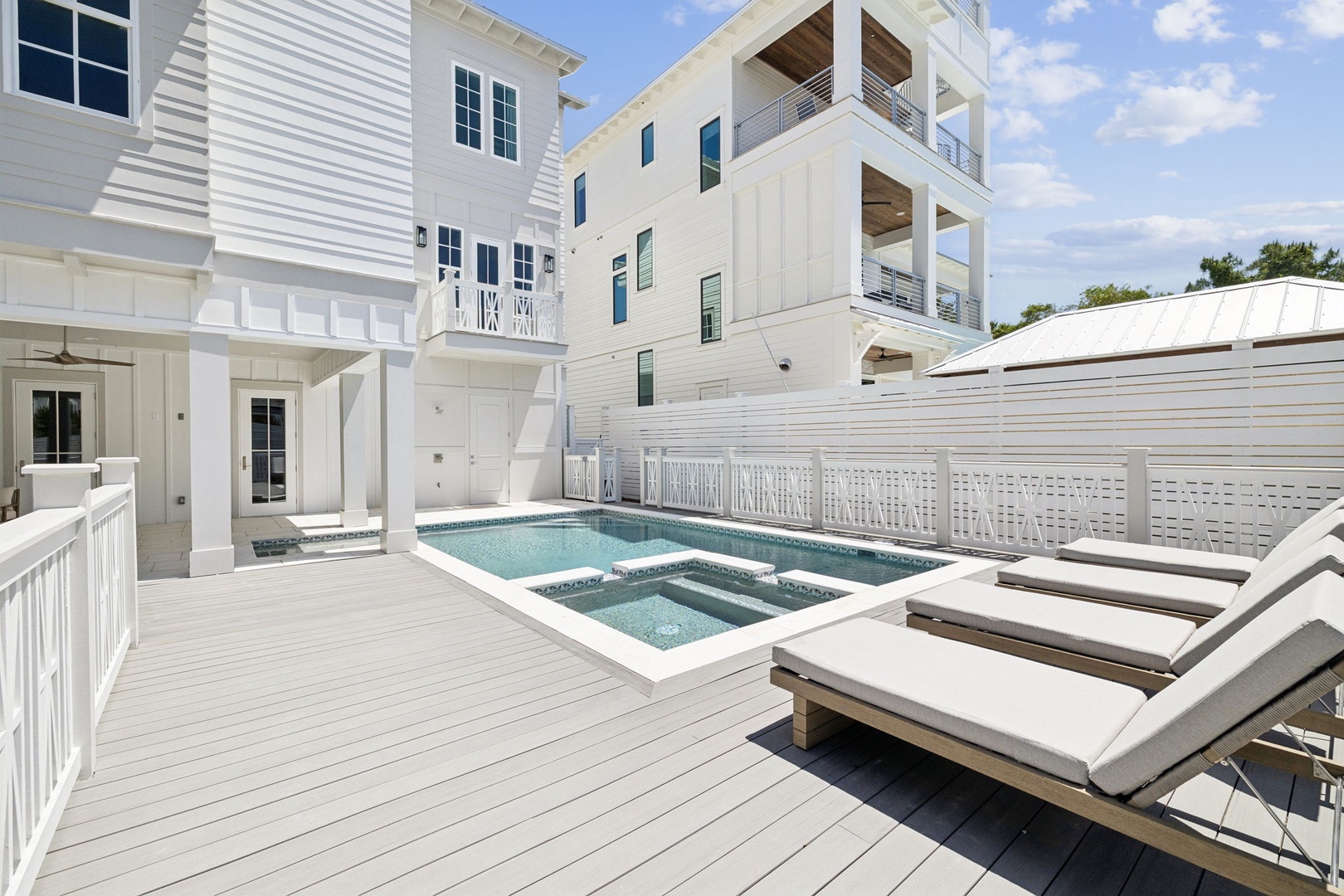 Dive into your private pool paradise or relax on the sun loungers after a day of coastal adventures.