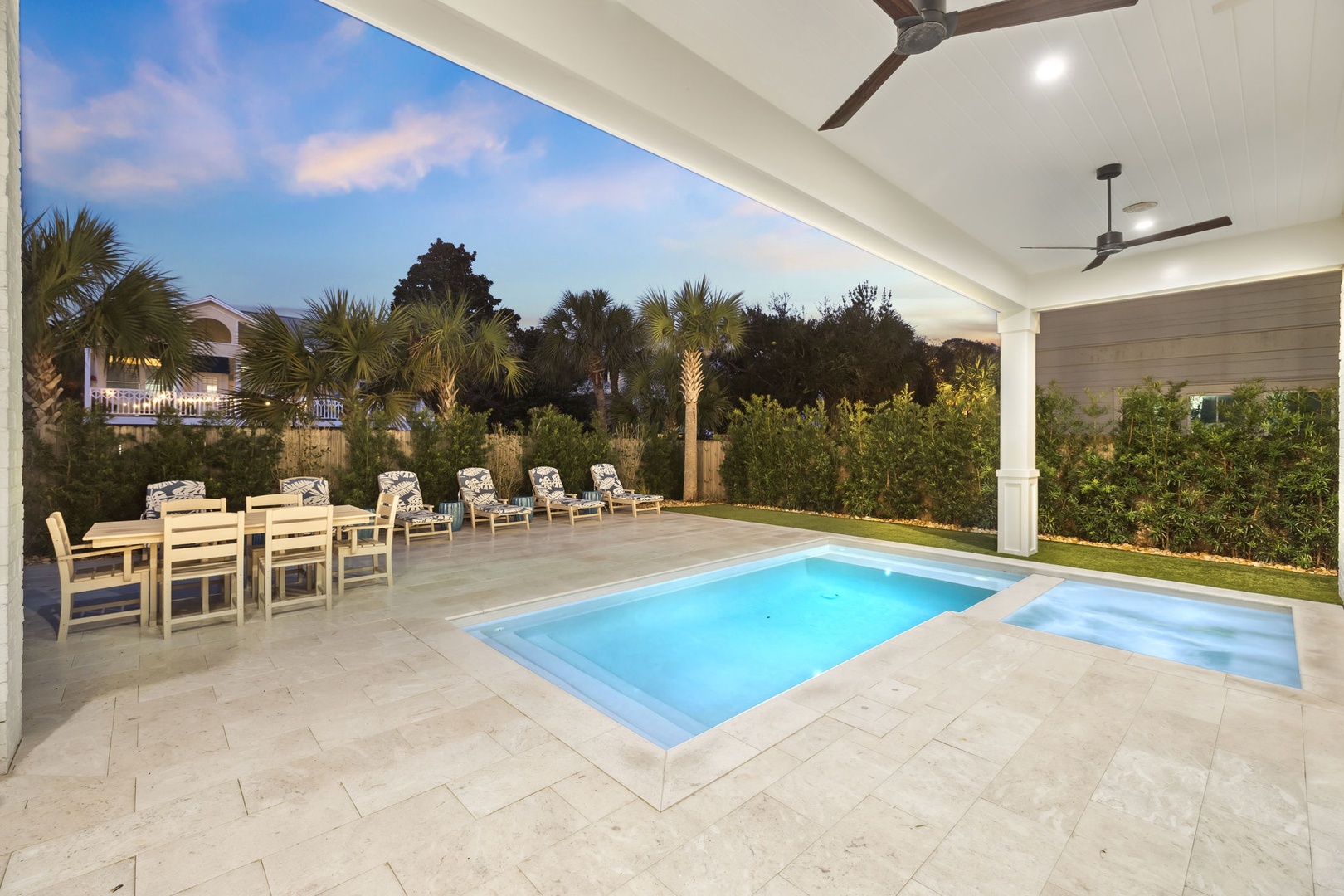 Your private pool oasis awaits under the covered patio, where you can dine al fresco and unwind in tropical paradise.