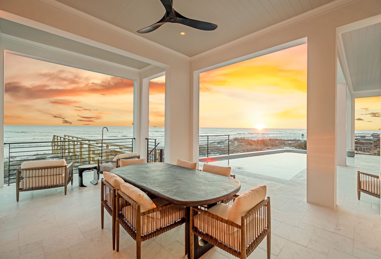 Watch the golden sunset paint the sky while dining on your private covered terrace, where ocean breezes and stunning views create unforgettable evenings.