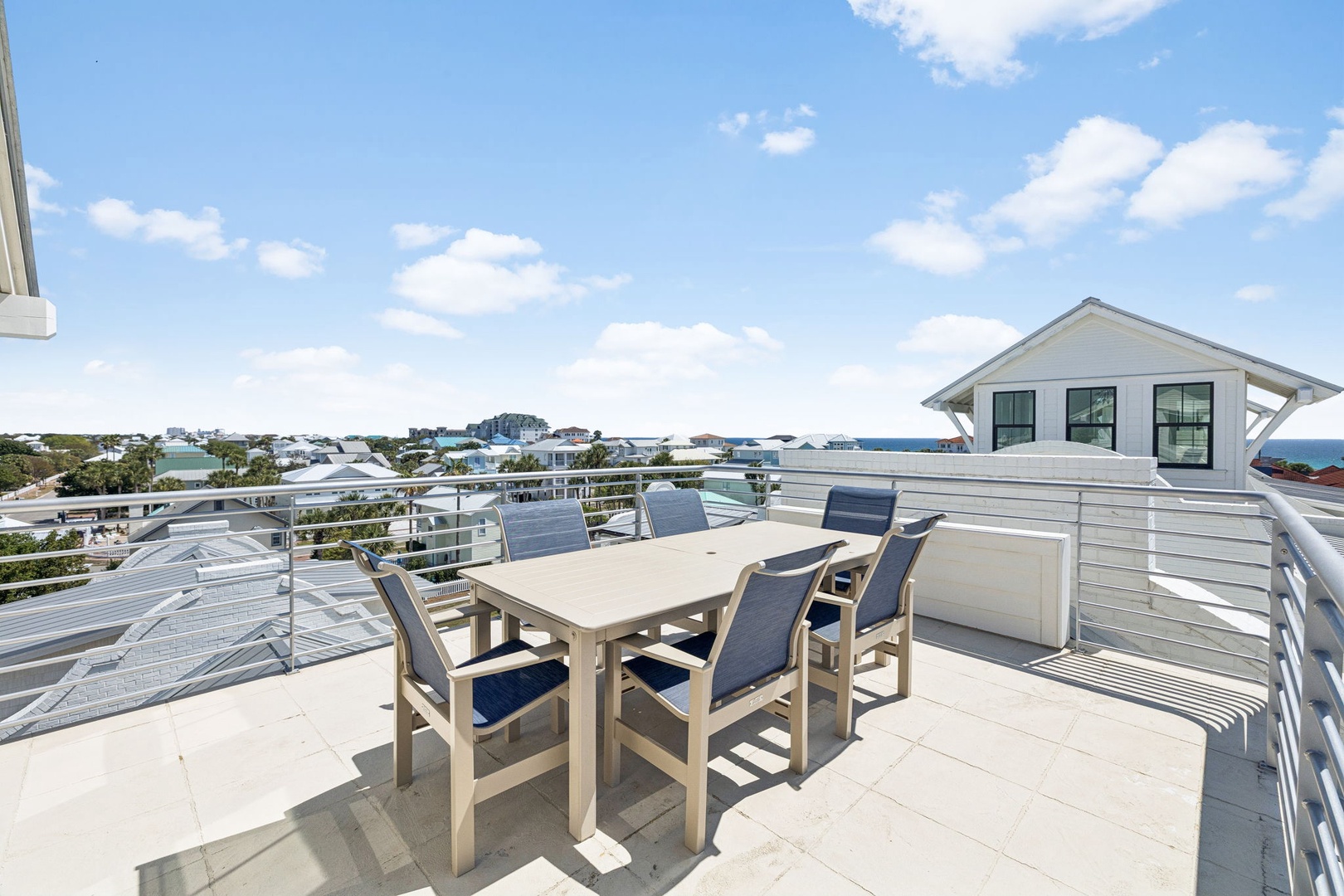 Take in coastal views while dining al fresco at your private rooftop terrace, complete with stylish seating for memorable meals.