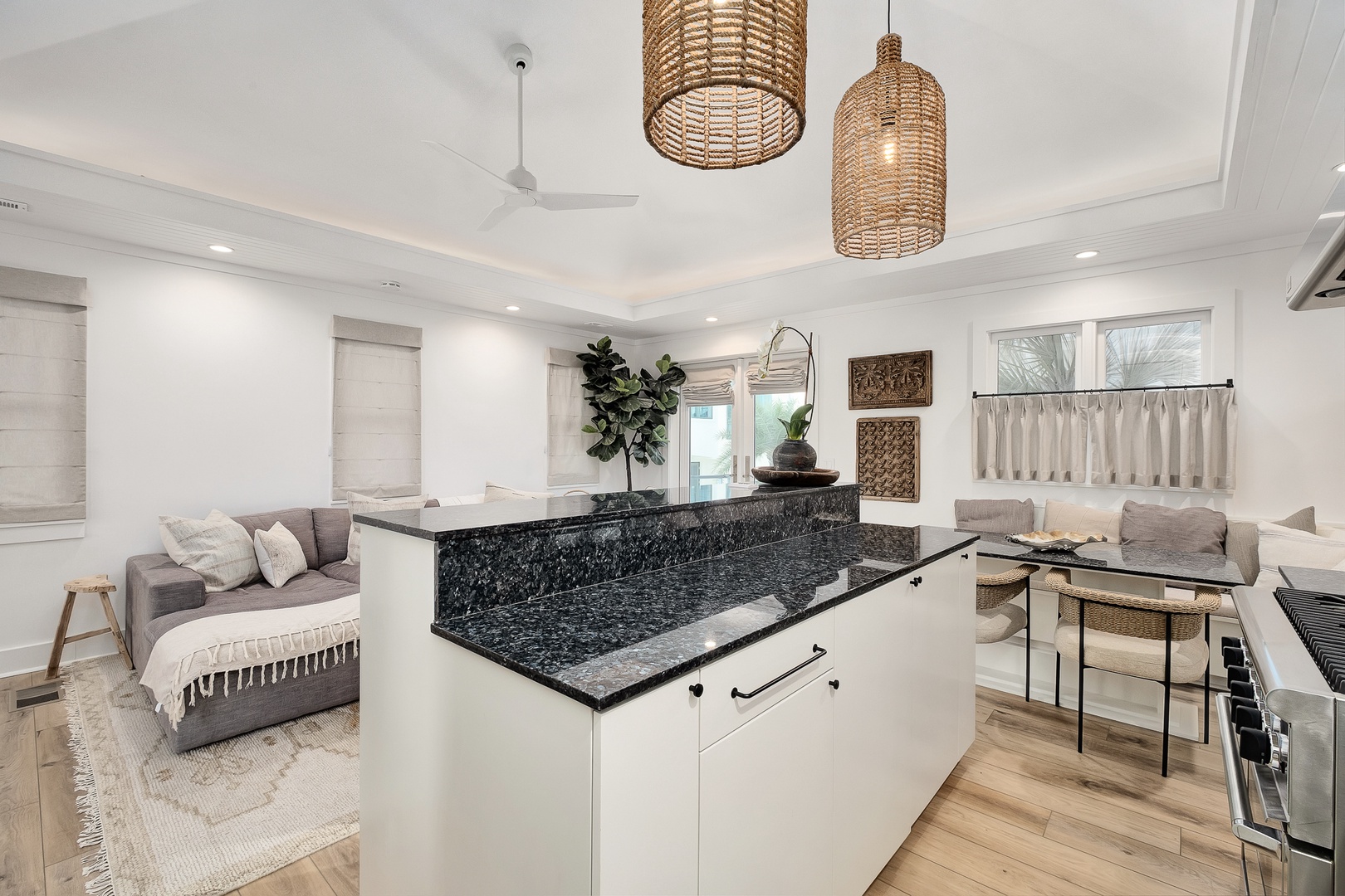 Unwind in this bright open-plan space where your kitchen flows seamlessly into the cozy living area, perfect for cooking and relaxing together.