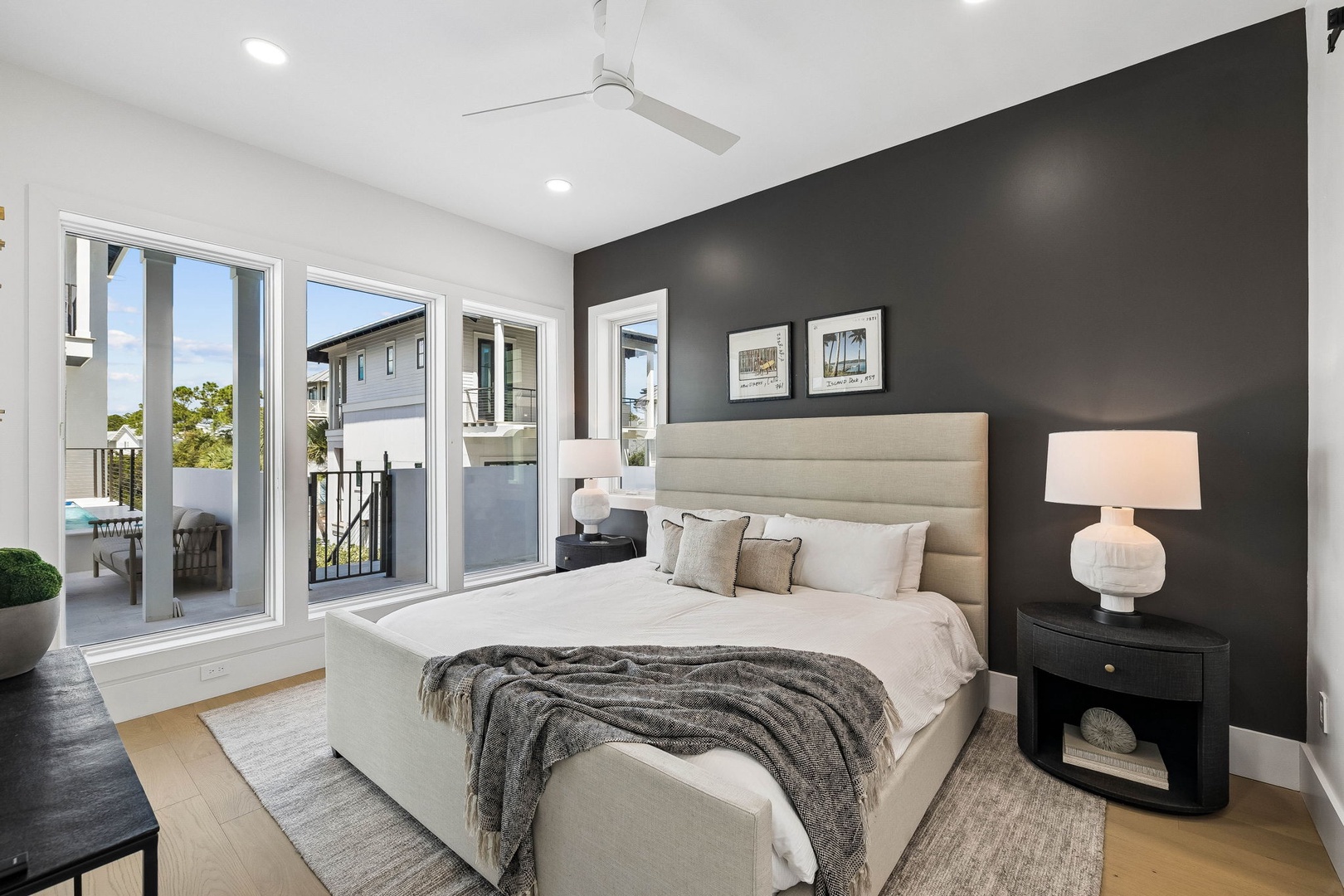 Wake up to refreshing breezes and natural light flooding your private retreat, where sleek modern style meets coastal comfort just steps from your balcony.