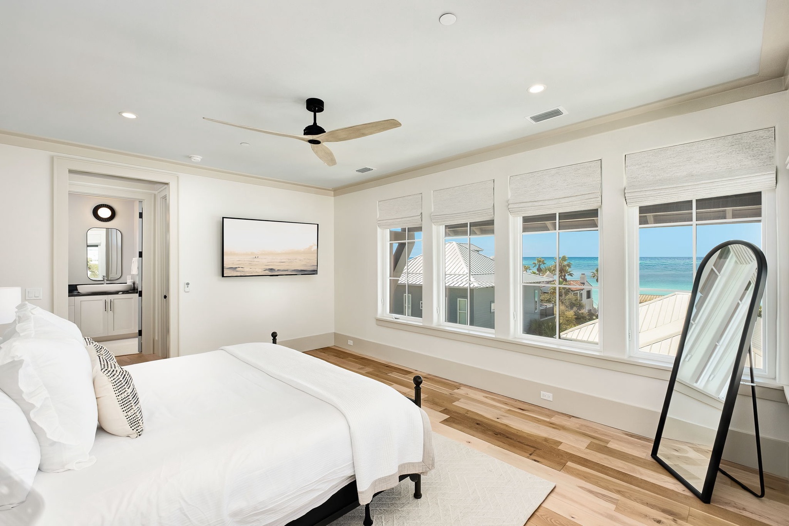 Wake up to breathtaking ocean views from your master bedroom, where coastal elegance meets modern comfort in this stunning retreat.