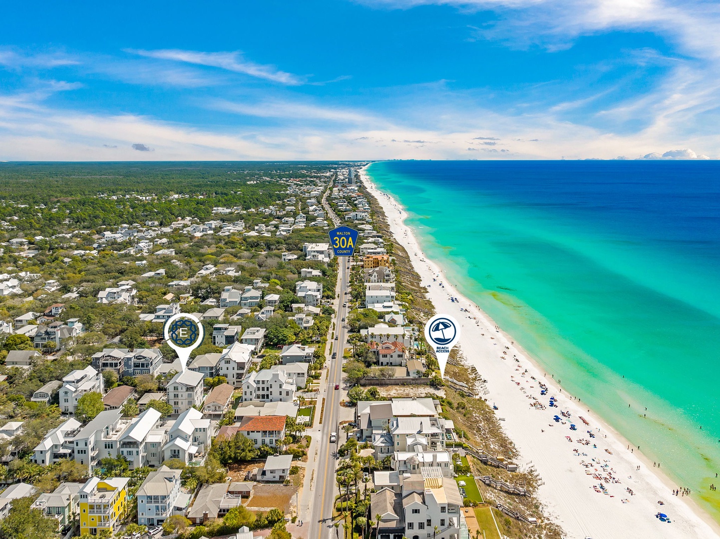 Aerial view of beautiful coastal community with pristine white sand beach and turquoise waters along scenic Highway 30A.