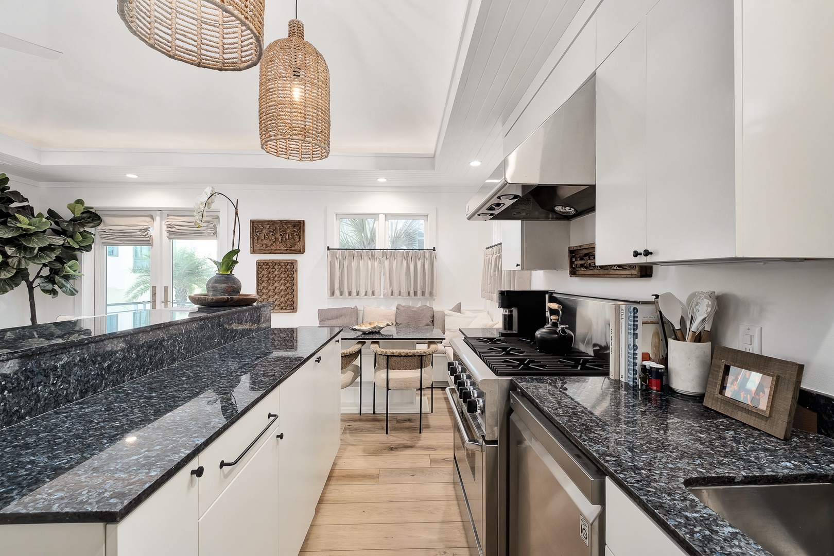 You'll love cooking in this bright, spacious kitchen with granite countertops, modern appliances, and beautiful natural light streaming through large windows.