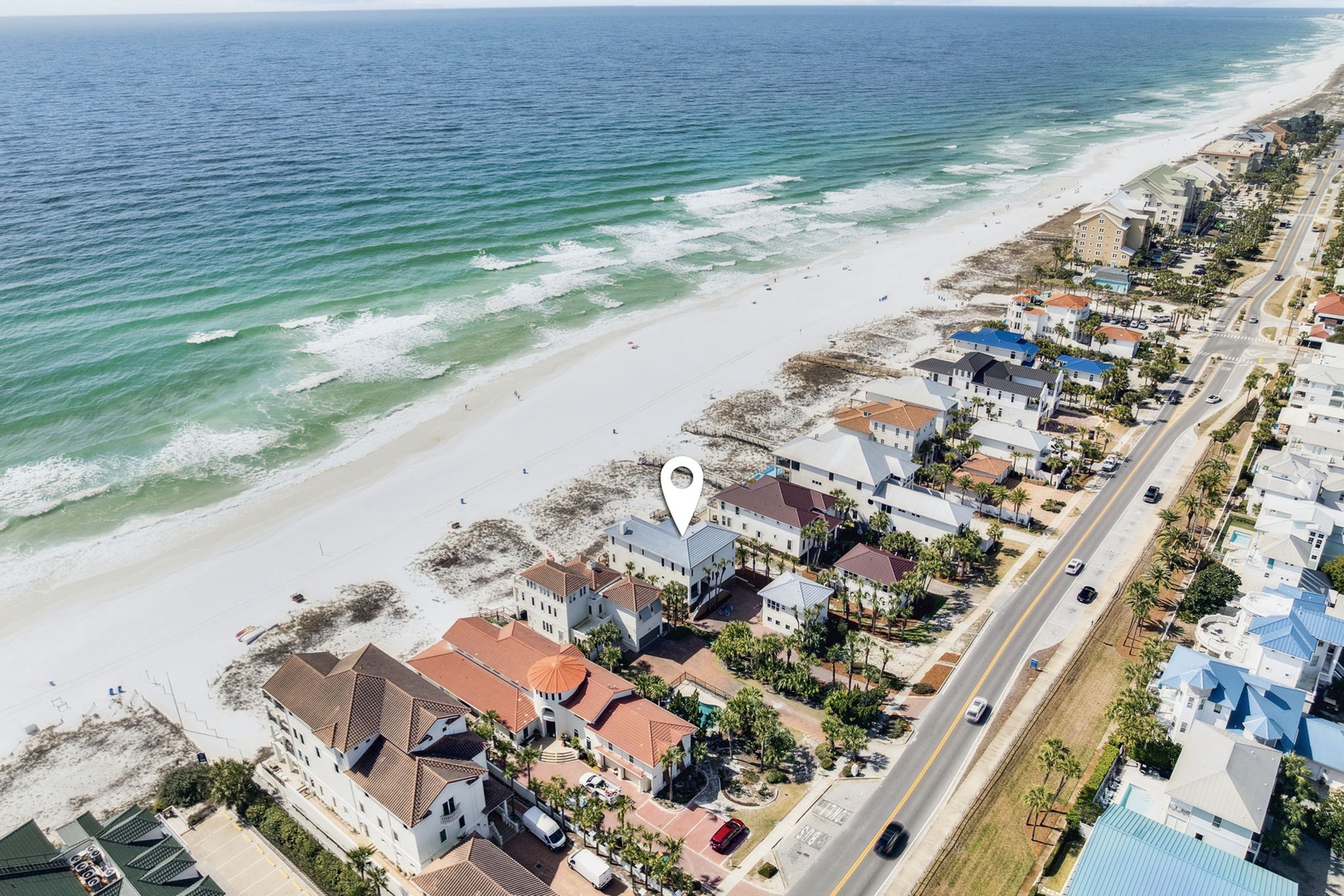 Stunning beachfront location with pristine white sand and emerald waters just steps away.