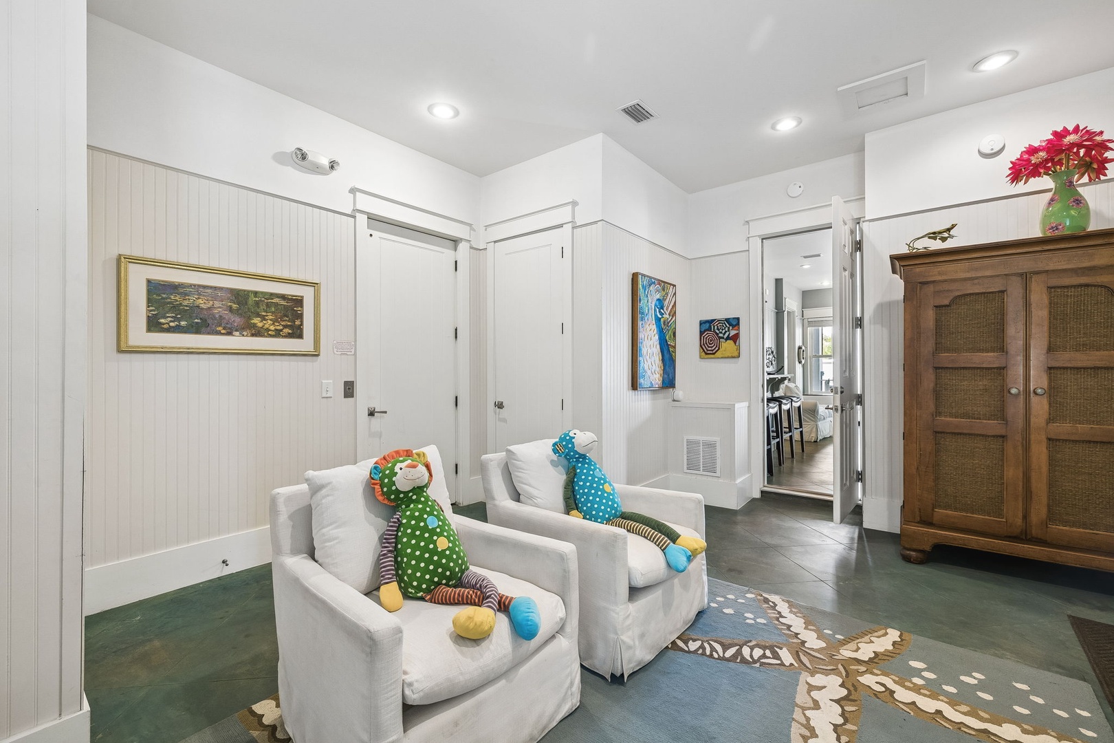 Settle into your cozy armchairs and let the cheerful décor welcome you home—this inviting space is perfect for unwinding after a day of adventure.