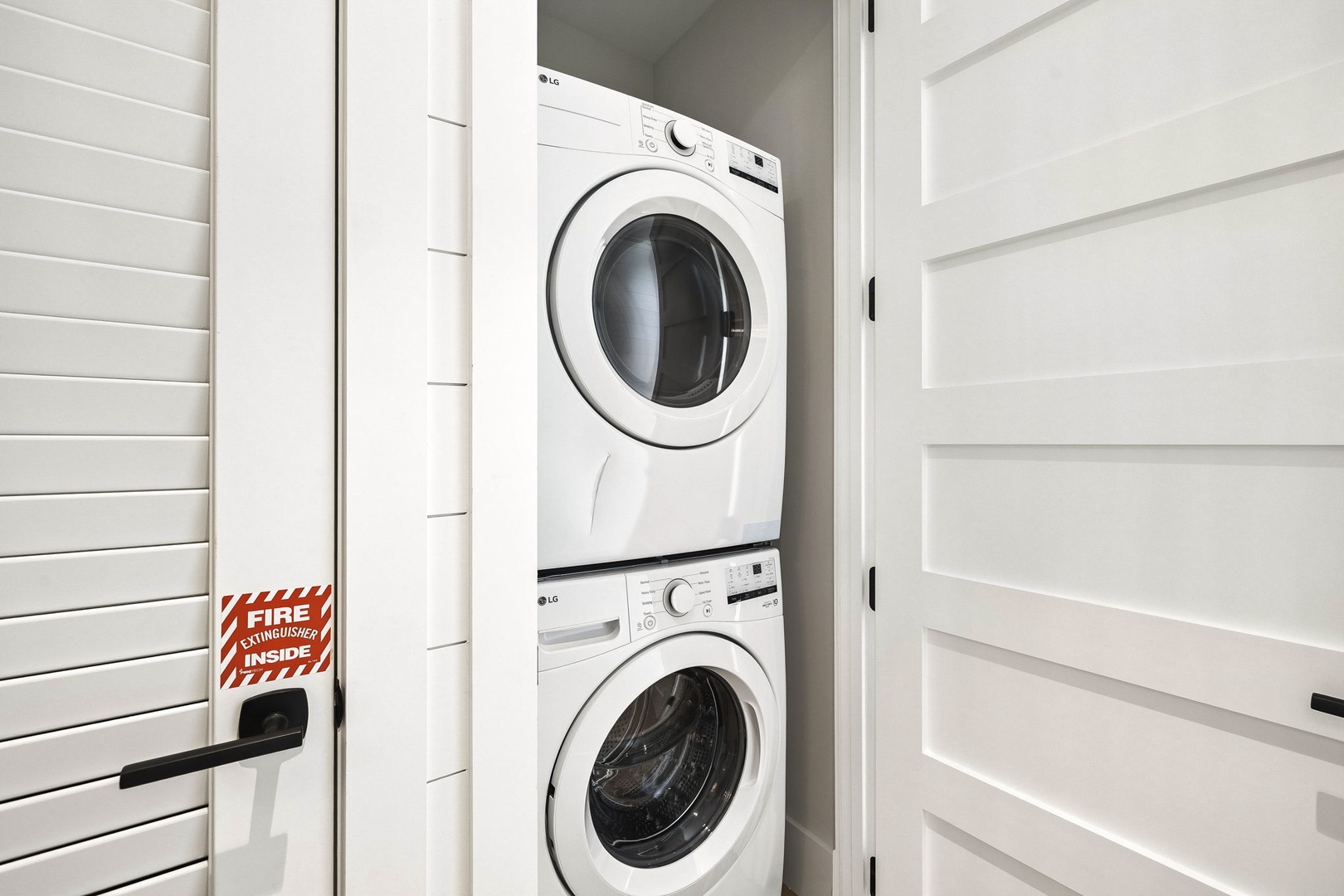 A stacked washer and dryer await your arrival, making it easy to pack light and keep fresh clothes on hand throughout your stay.