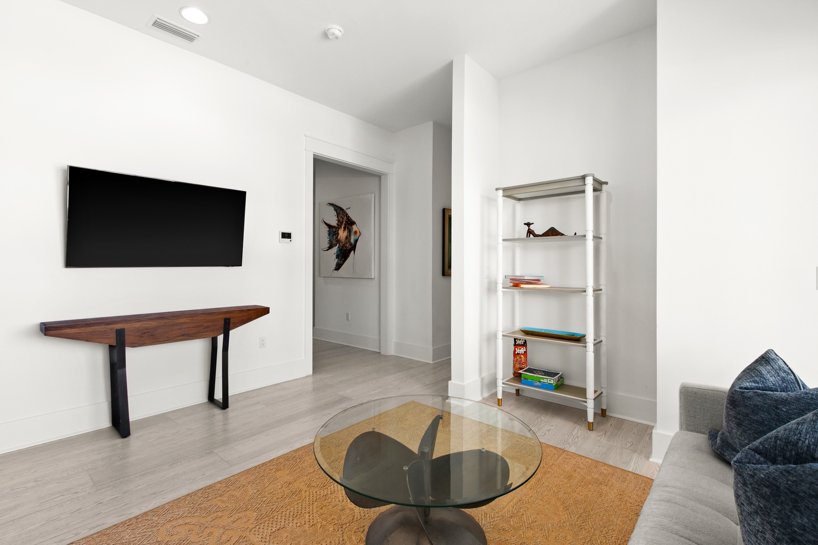 Unwind in your bright, modern living space with sleek furnishings and an open, airy feel—perfect for relaxing after a day of exploring.