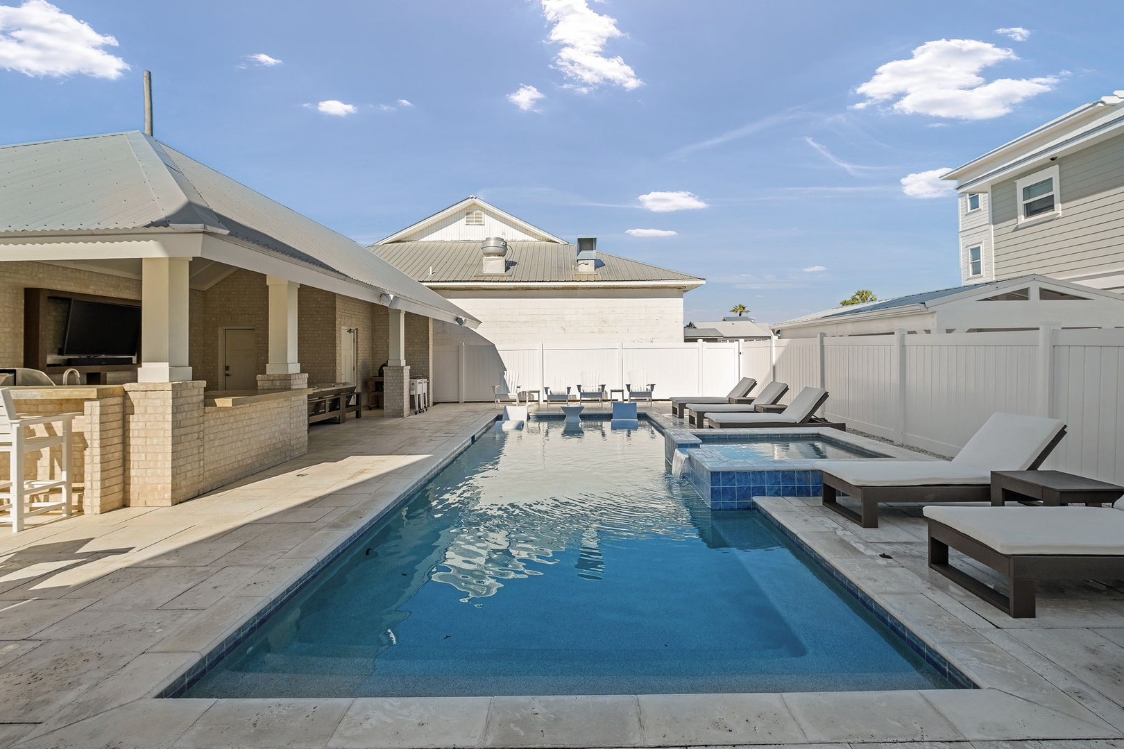 Dive into your private pool oasis, where crystal-clear waters and luxury loungers create the perfect backdrop for sun-soaked relaxation.
