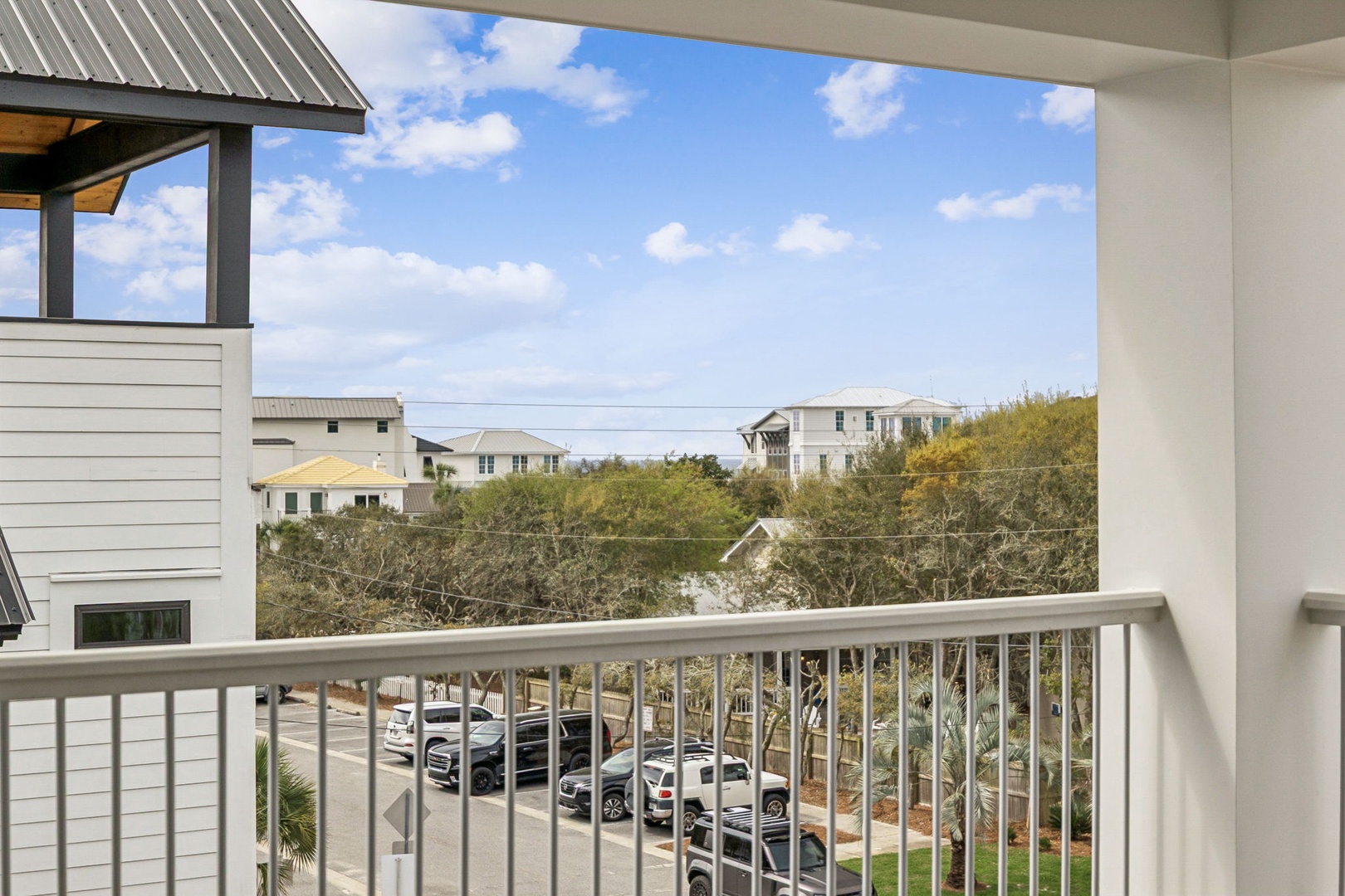 Step onto your private balcony and breathe in the fresh coastal air while enjoying peaceful views of the surrounding neighborhood.
