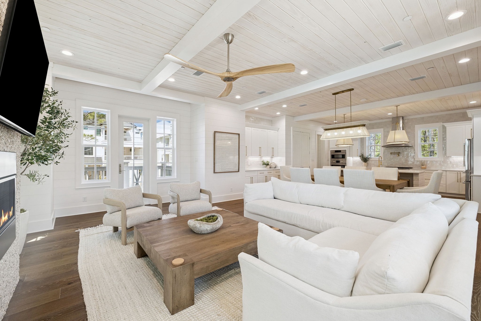 Sink into this sumptuous sectional and enjoy your open-plan living space with soaring ceilings and modern kitchen nearby.