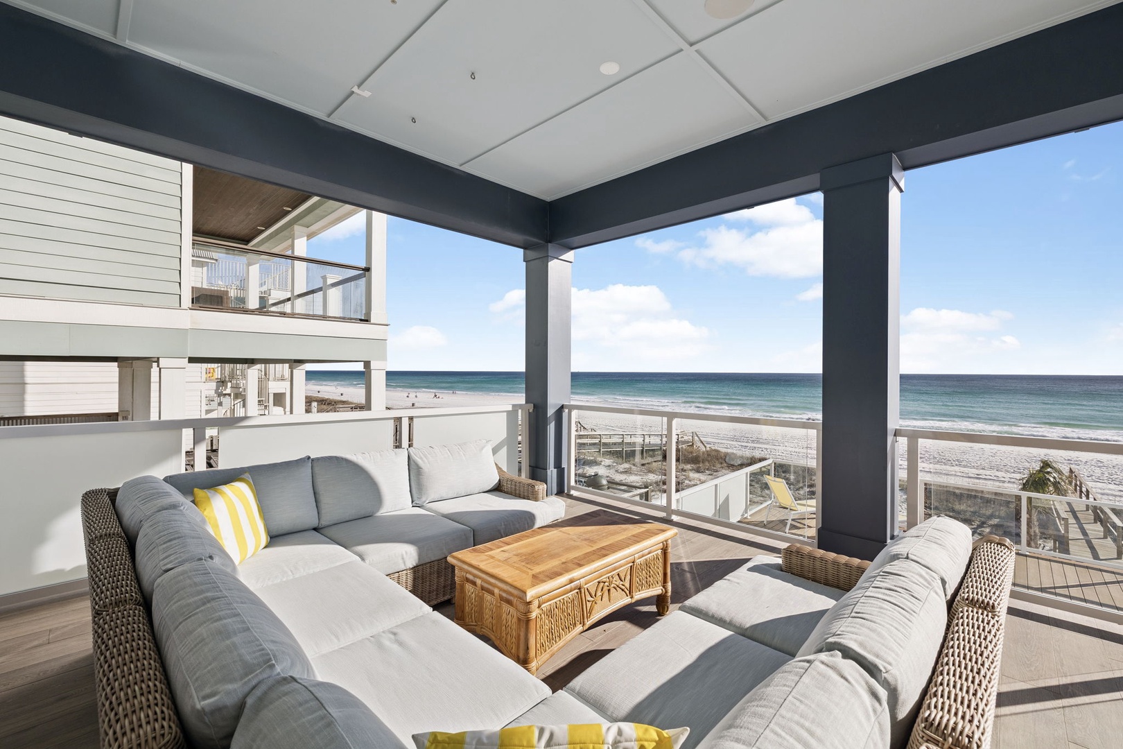 Sink into plush seating on your private oceanfront terrace, where endless sea views frame your morning coffee and sunset cocktails.