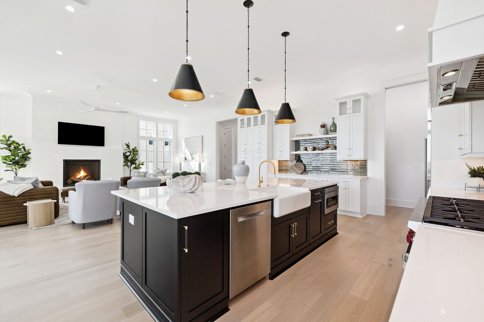 Your gourmet kitchen features marble countertops, premium appliances, and a cozy fireplace lounge—perfect for cooking memorable meals together.