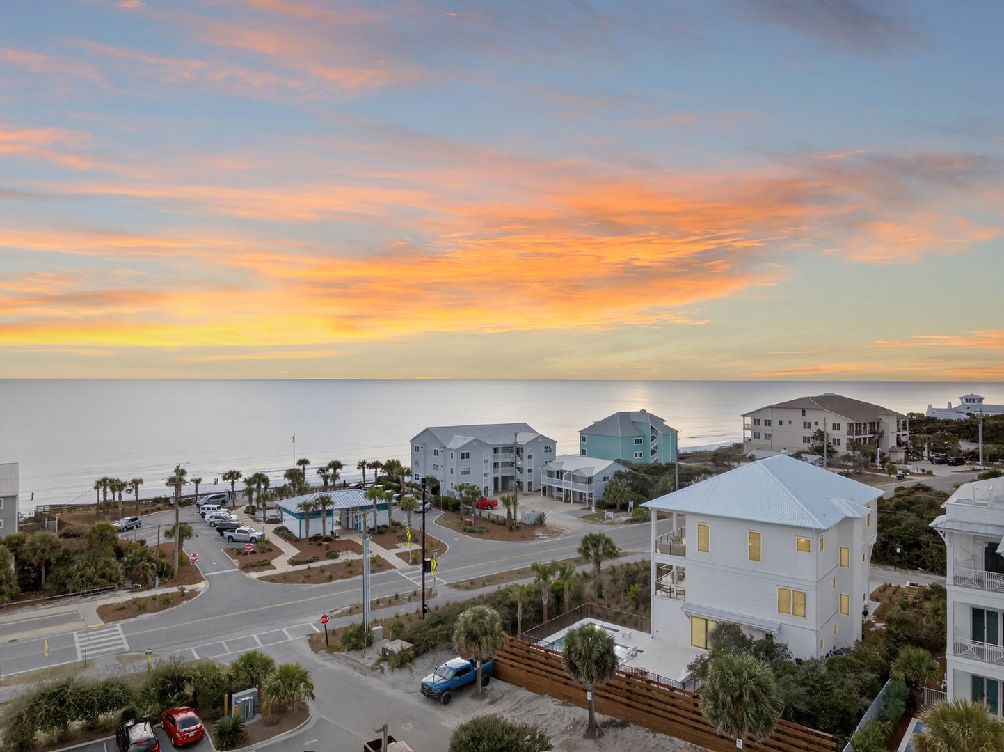 Stunning beachfront community with colorful vacation homes nestled between pristine coastline and peaceful residential streets.