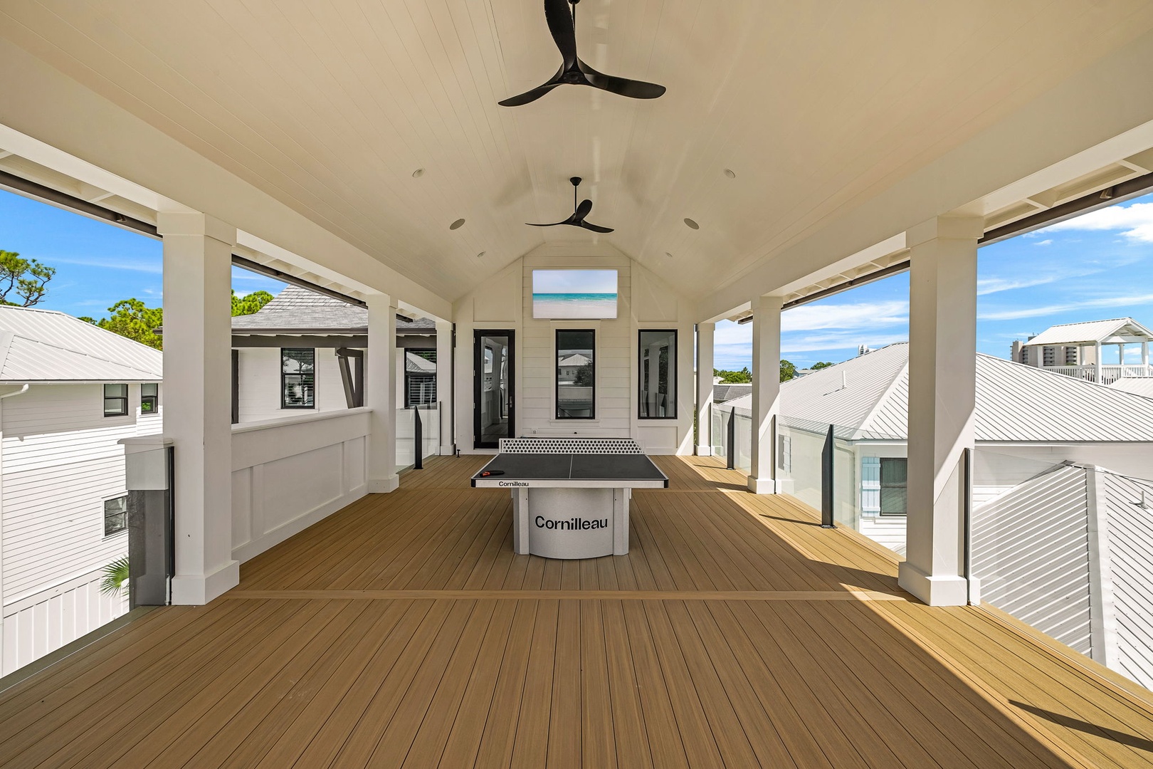Enjoy games and ocean breezes on your covered upper deck, with room for fun under vaulted ceilings and ceiling fans keeping you comfortable.