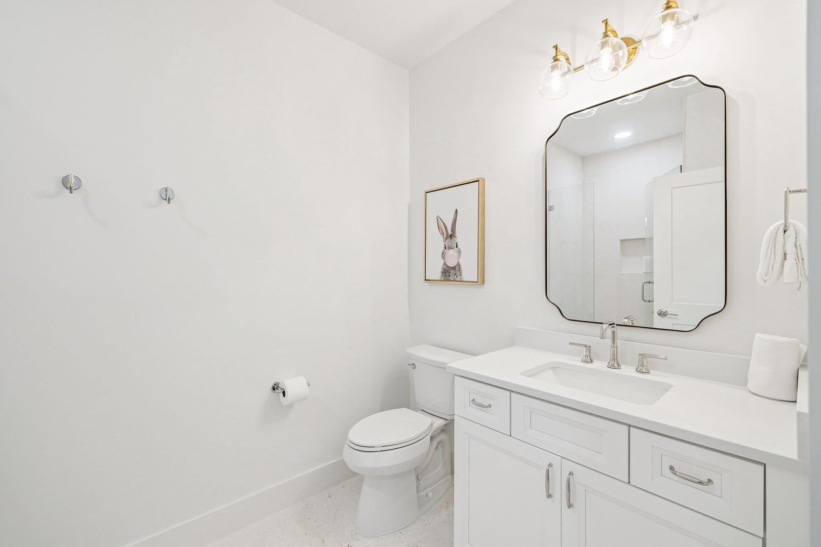 Refresh in your bright, clean bathroom with elegant marble countertops, stylish vanity, and thoughtful touches that make your daily routine feel luxurious.