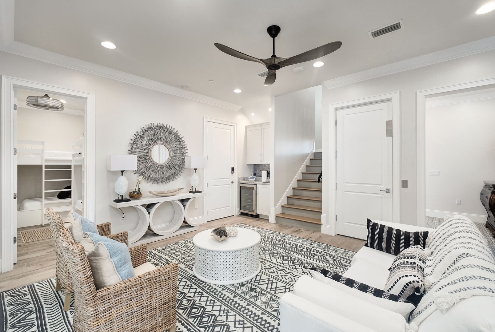 Relax in your stylish living space with comfortable seating and modern coastal décor that creates the perfect atmosphere for unwinding.